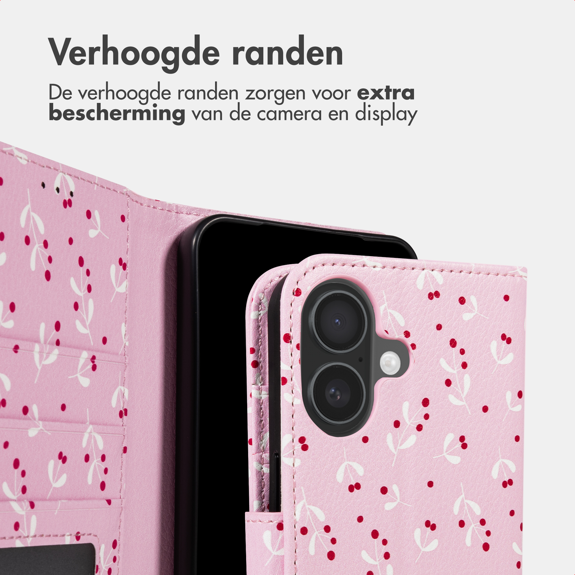 Een roze telefoonhoes met wit bessenpatroon en verhoogde randen.