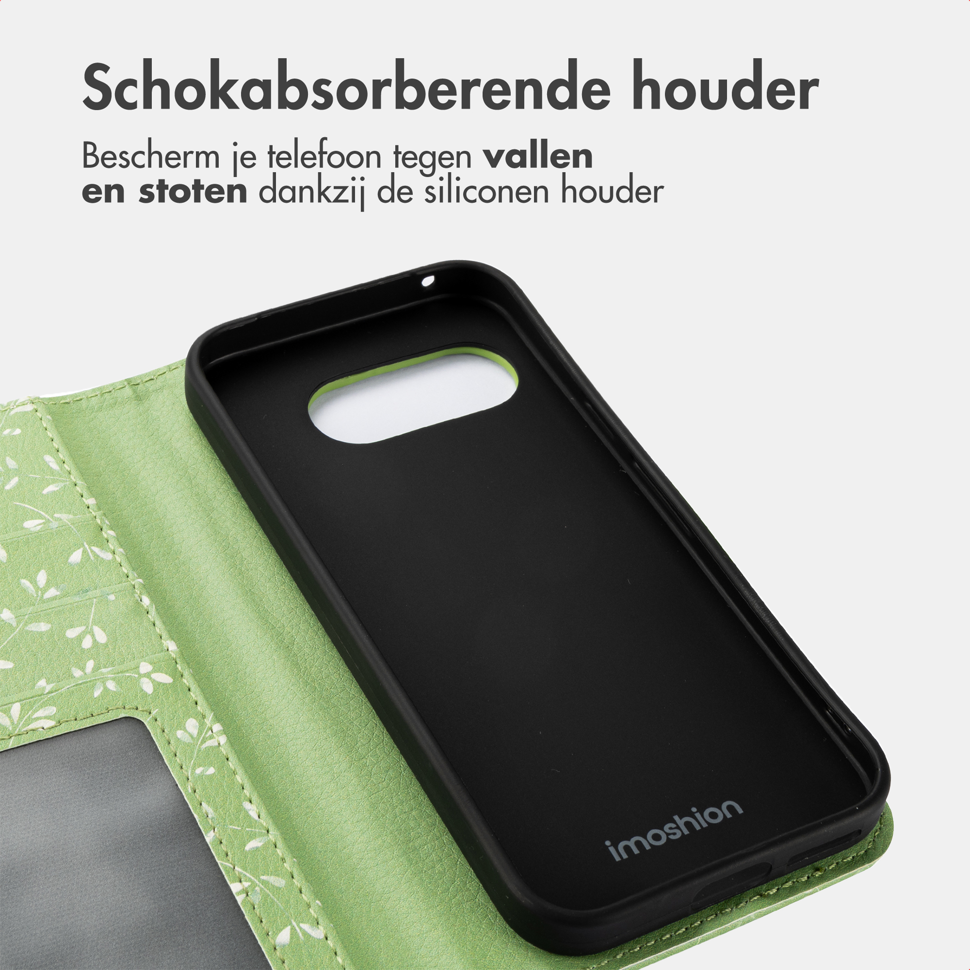 Groene telefoonhoes met bladerenpatroon en zwart inzetstuk.