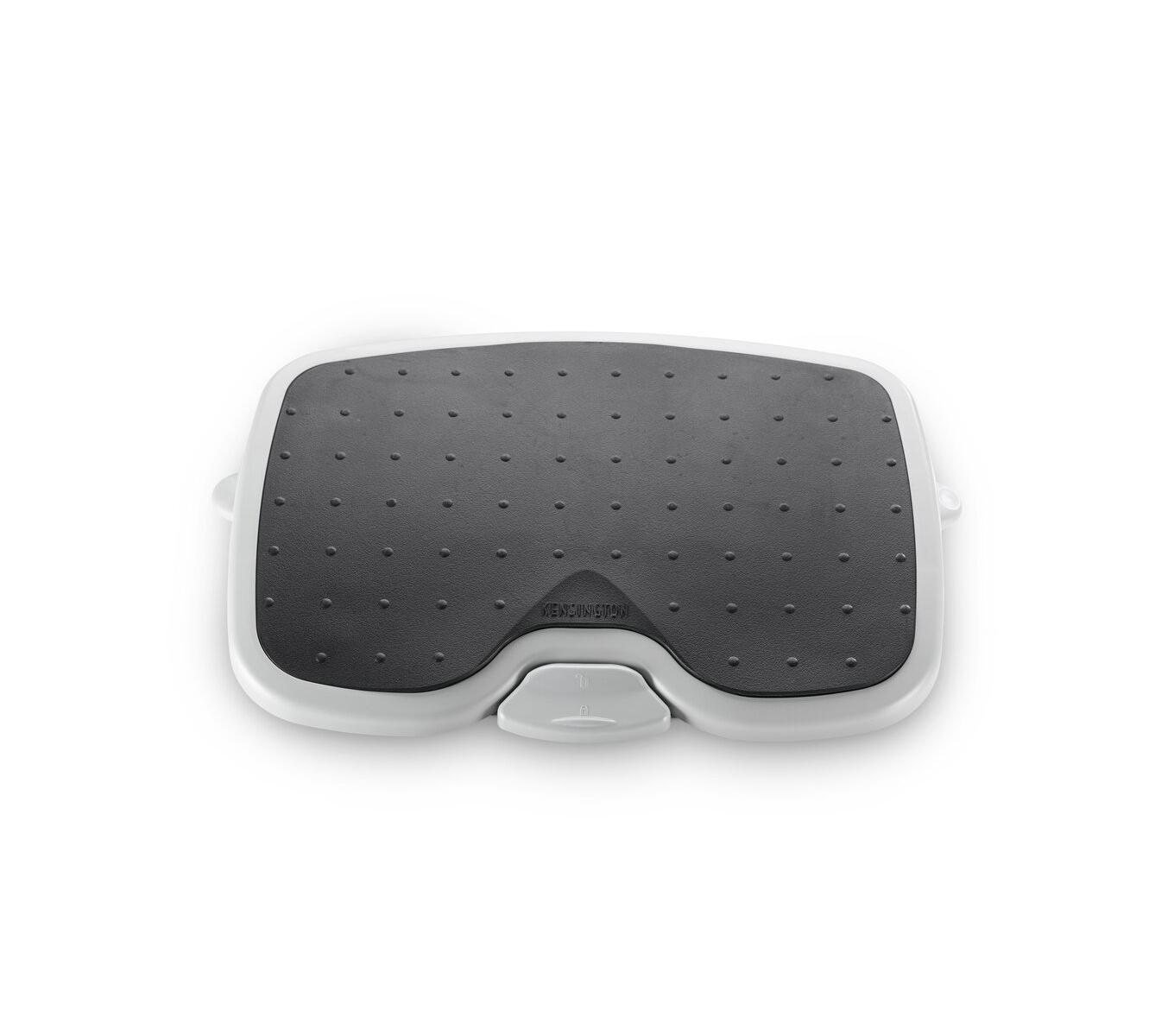 Ein weißer, ergonomischer Fußhocker mit einer schwarzen, gepunkteten Trittfläche.