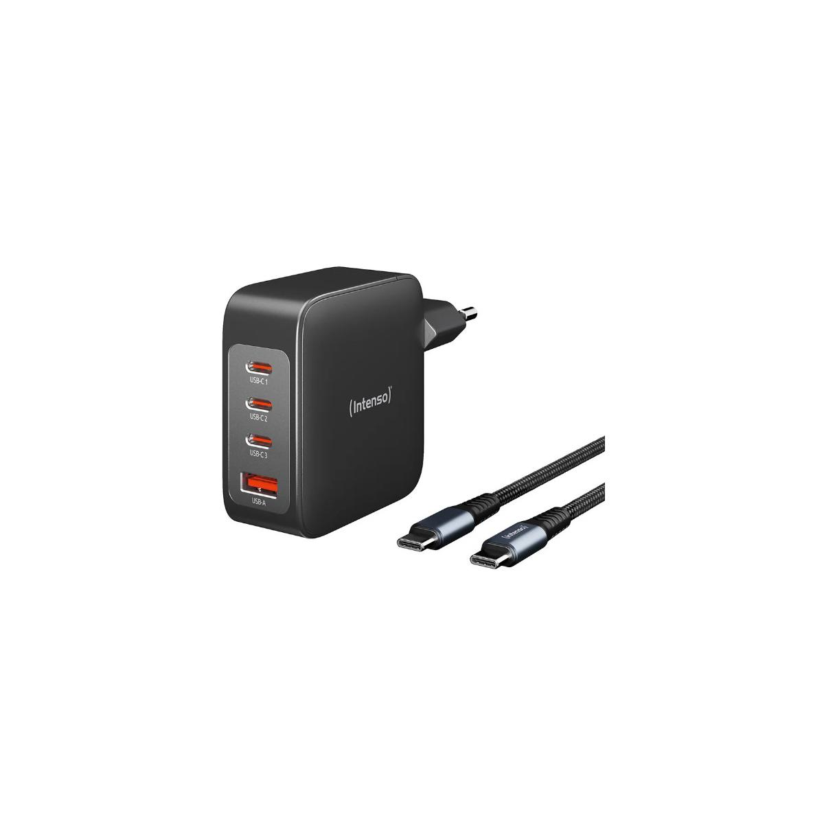 Black power adapter with three USB-C and one USB-A port, two cables beside it.
