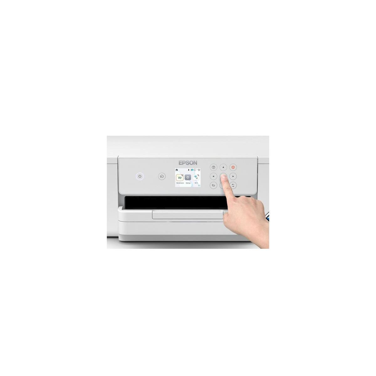 A hand presses the screen of a white Epson printer.