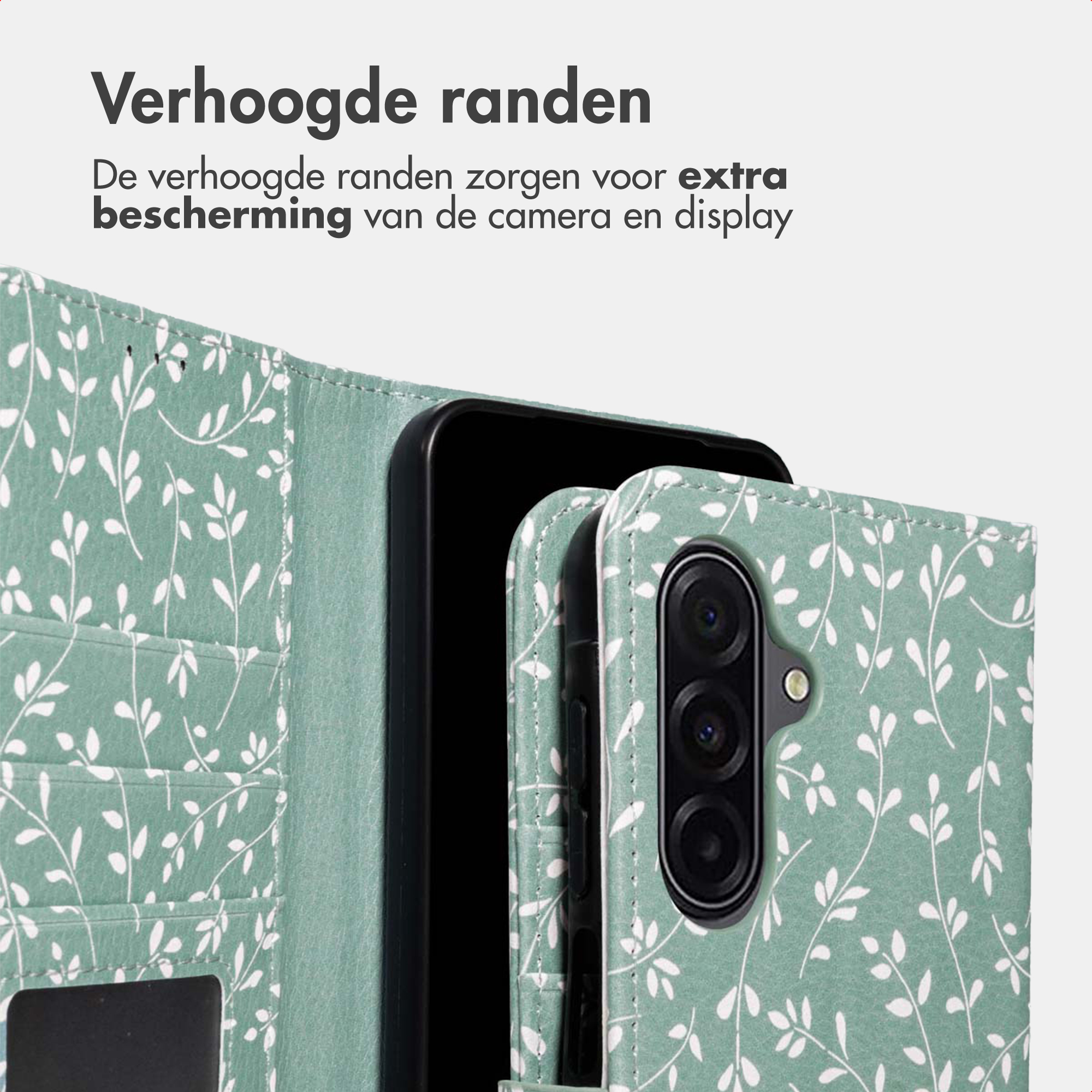Een telefoon in een groene hoes met bladerpatroon en verhoogde randen.