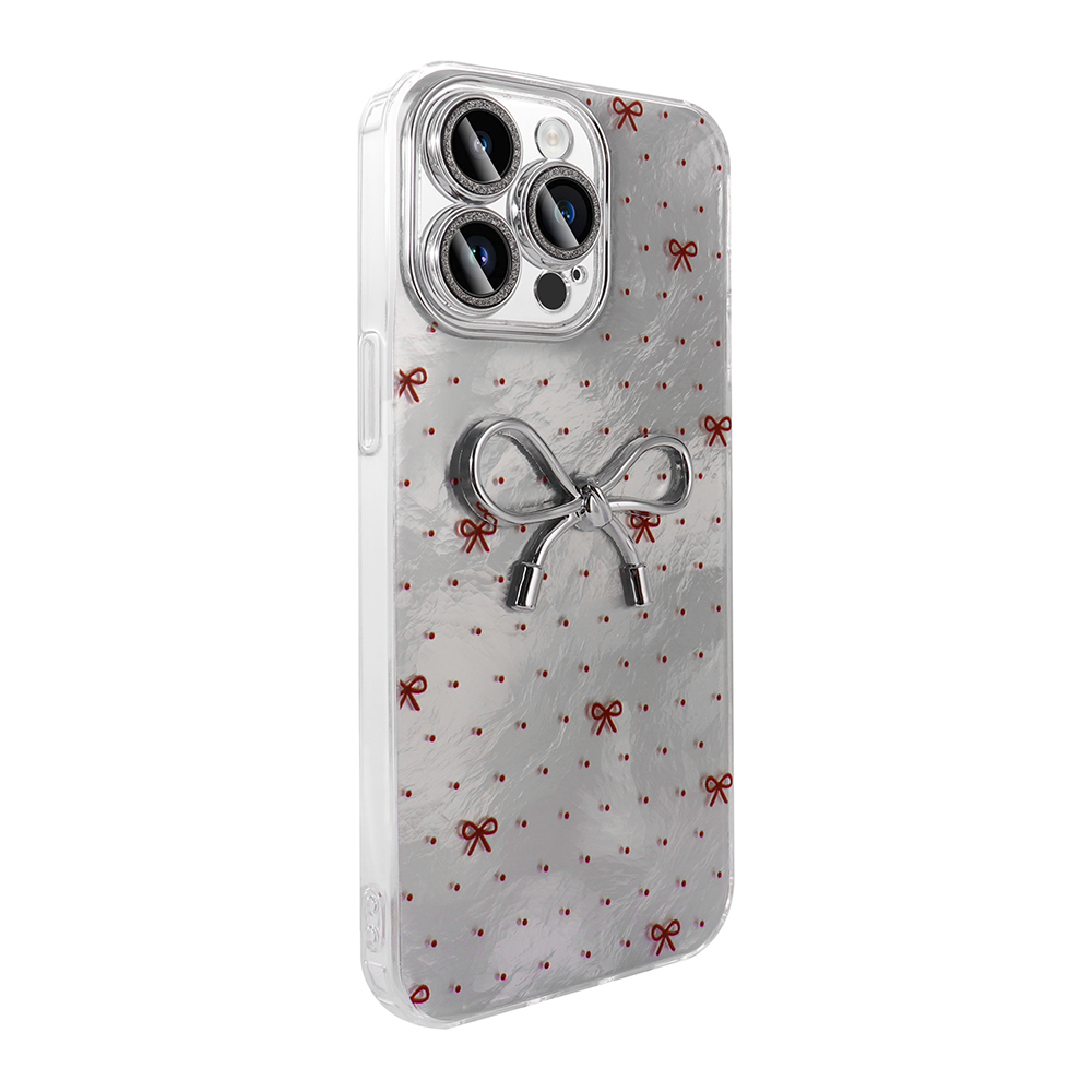 Kırmızı fiyonklu gümüş telefon kılıfı ve gümüş fiyonk halka tutucu.