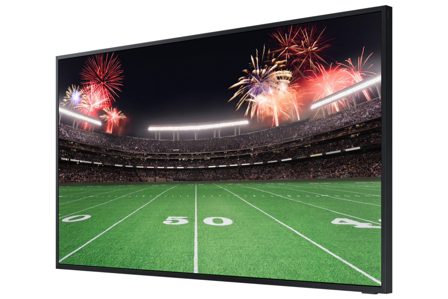 Uno stadio di football di notte con fuochi d'artificio e luci.