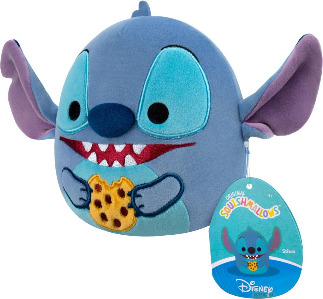 Ein blaues Stitch-Plüschtier hält einen Keks. Es hat große Ohren und ein Etikett.