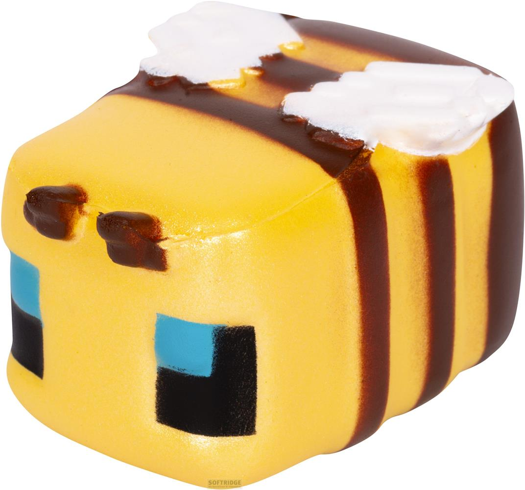 Un cubo giallo con strisce marroni e finestre blu.