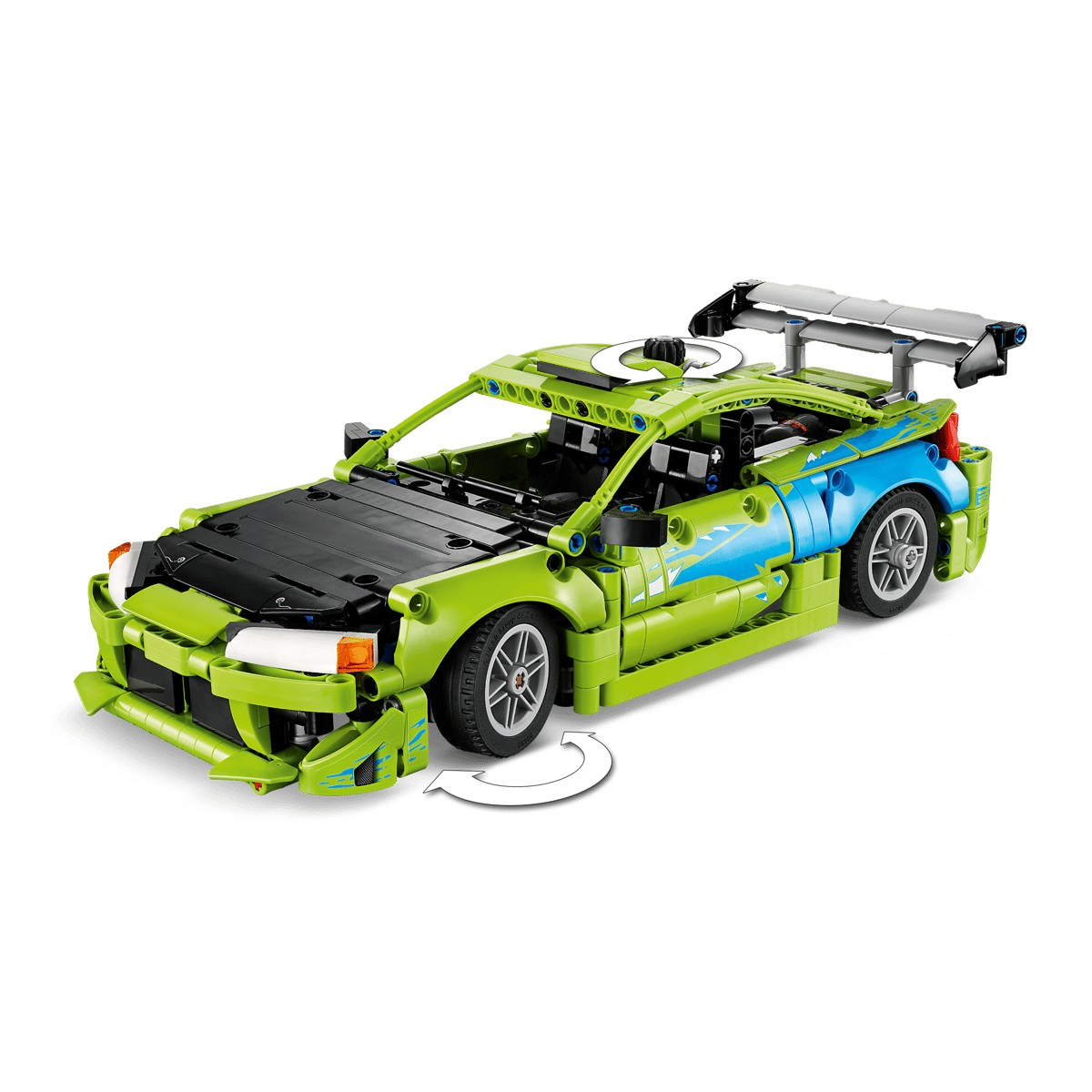 Un coche de juguete verde con calcomanía azul y alerón trasero grande.