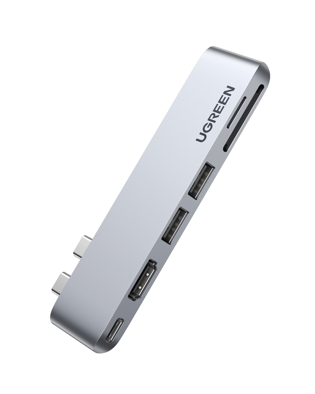 Gümüş renkli USB-C hub, bağlantı noktaları ve SD kart yuvaları.