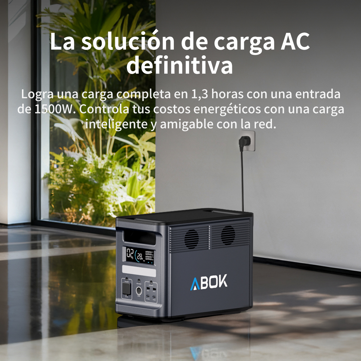 Una estación de energía portátil oscura con logo ABOK frente a ventana.