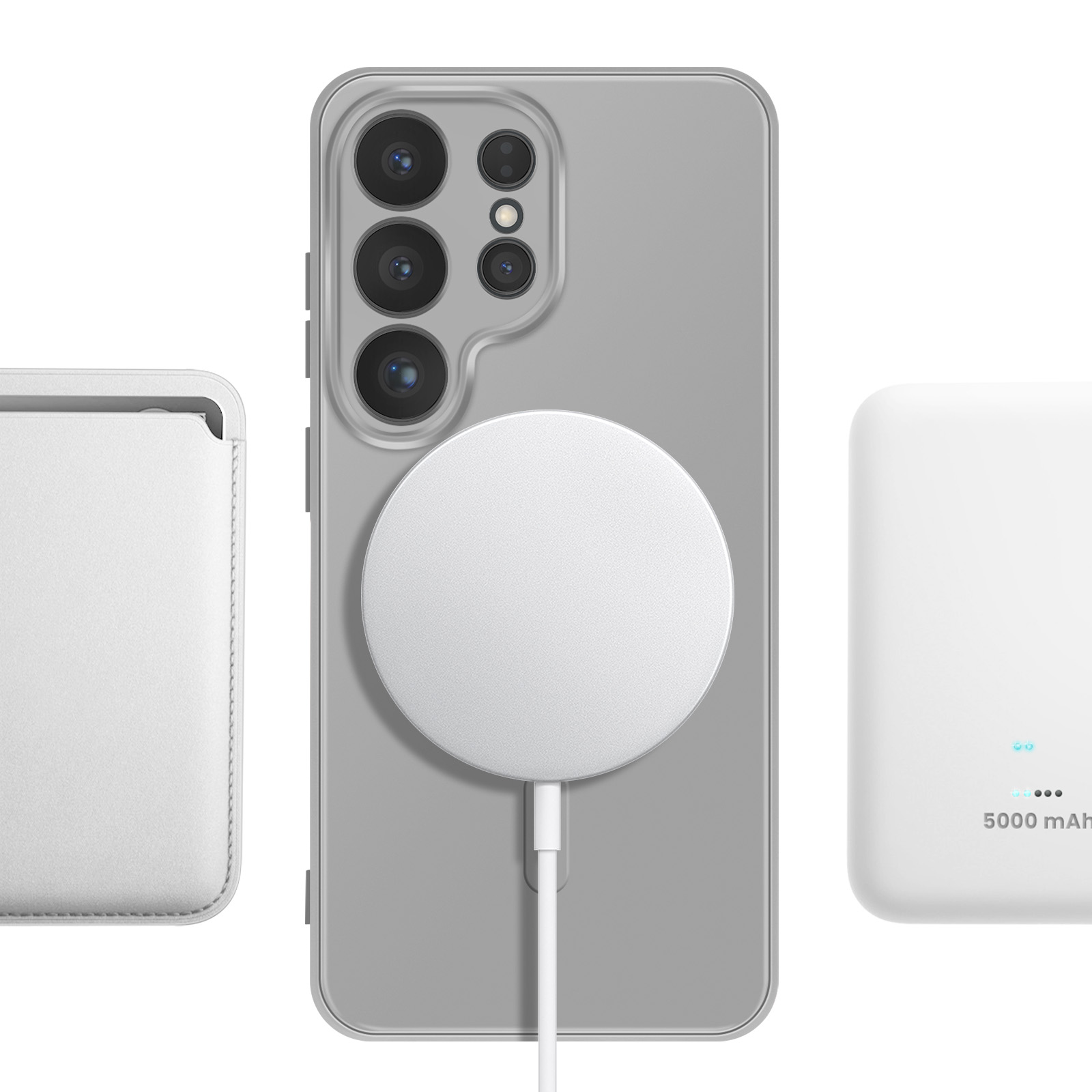 Ein graues Handy mit weißem magnetischem Ladegerät, neben weißem Kartenhalter und Powerbank.