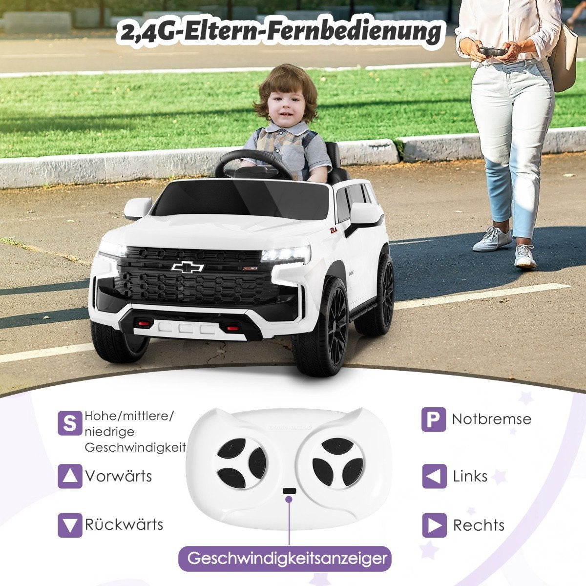 A toddler drives a white electric car, a woman holds a remote control.