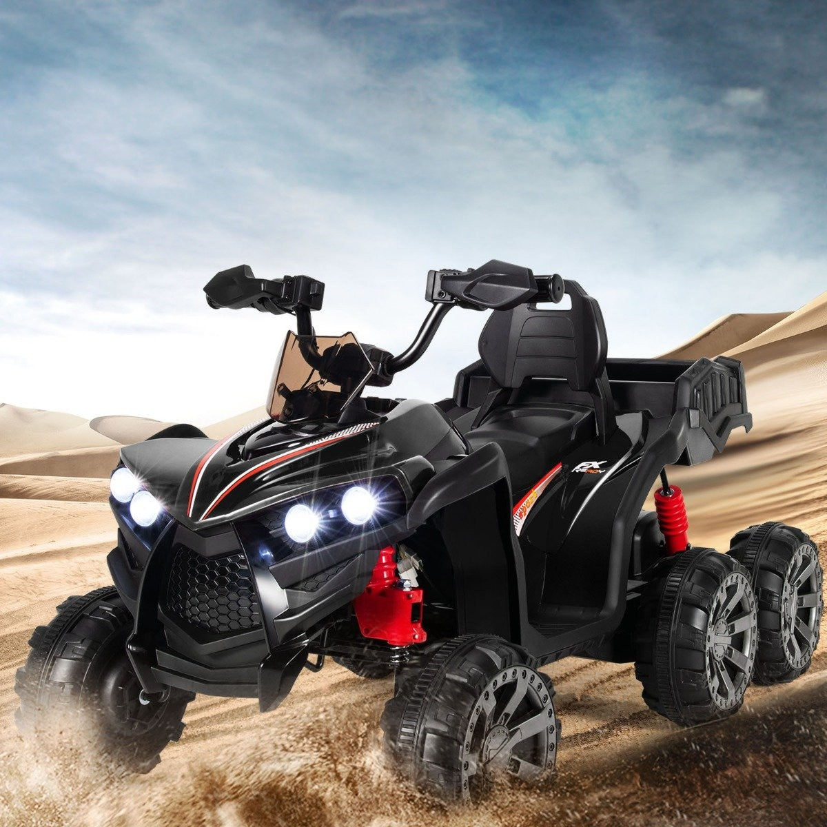 Black kids' quad with red accents driving through sand.
