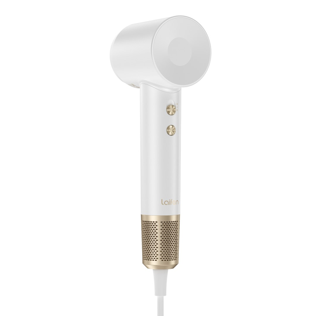 A white hairdryer with gold accents and a mesh grille at the base of the handle.