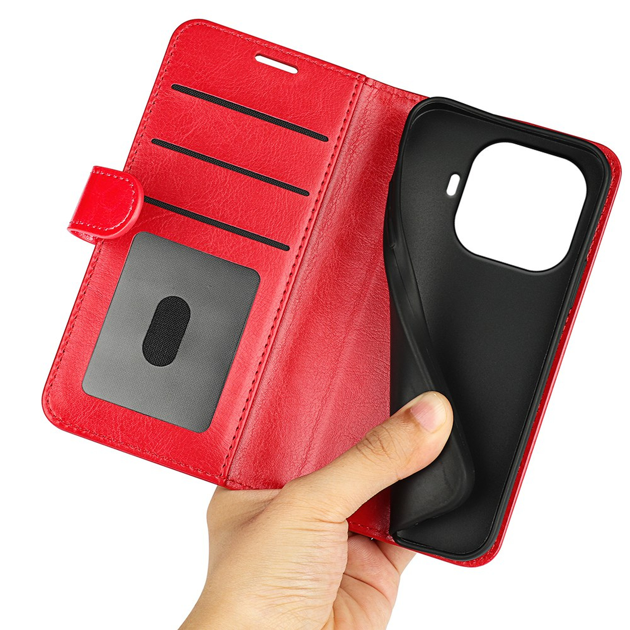 Red leather wallet case with card slots and black insert, held by a hand.