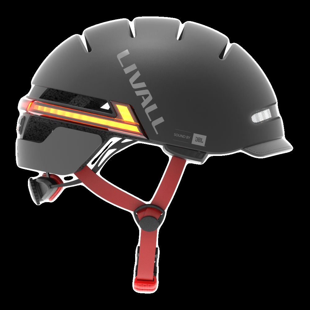 Casco nero con cinghie rosse e luci gialle.