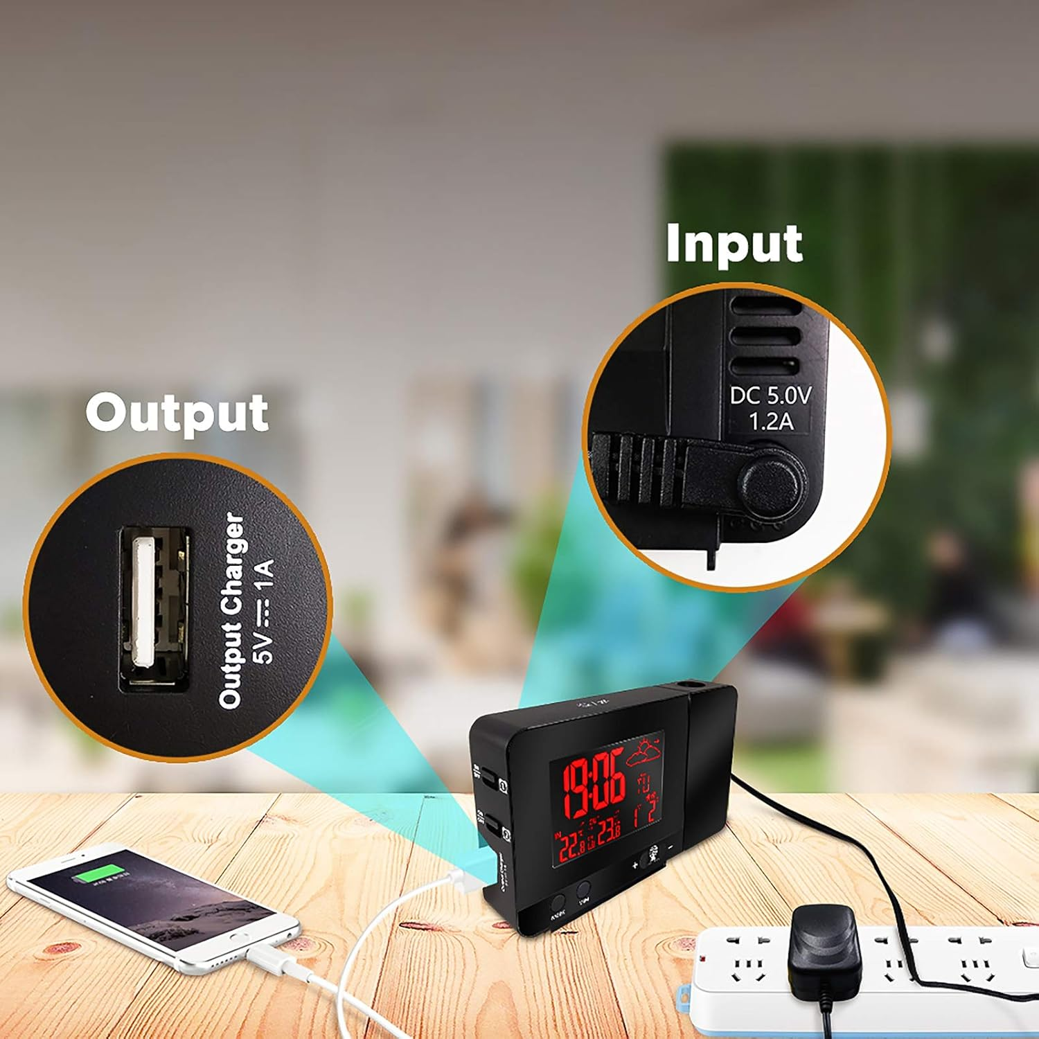 Ein Projektionswecker mit USB-Ladeanschluss lädt ein Smartphone auf.