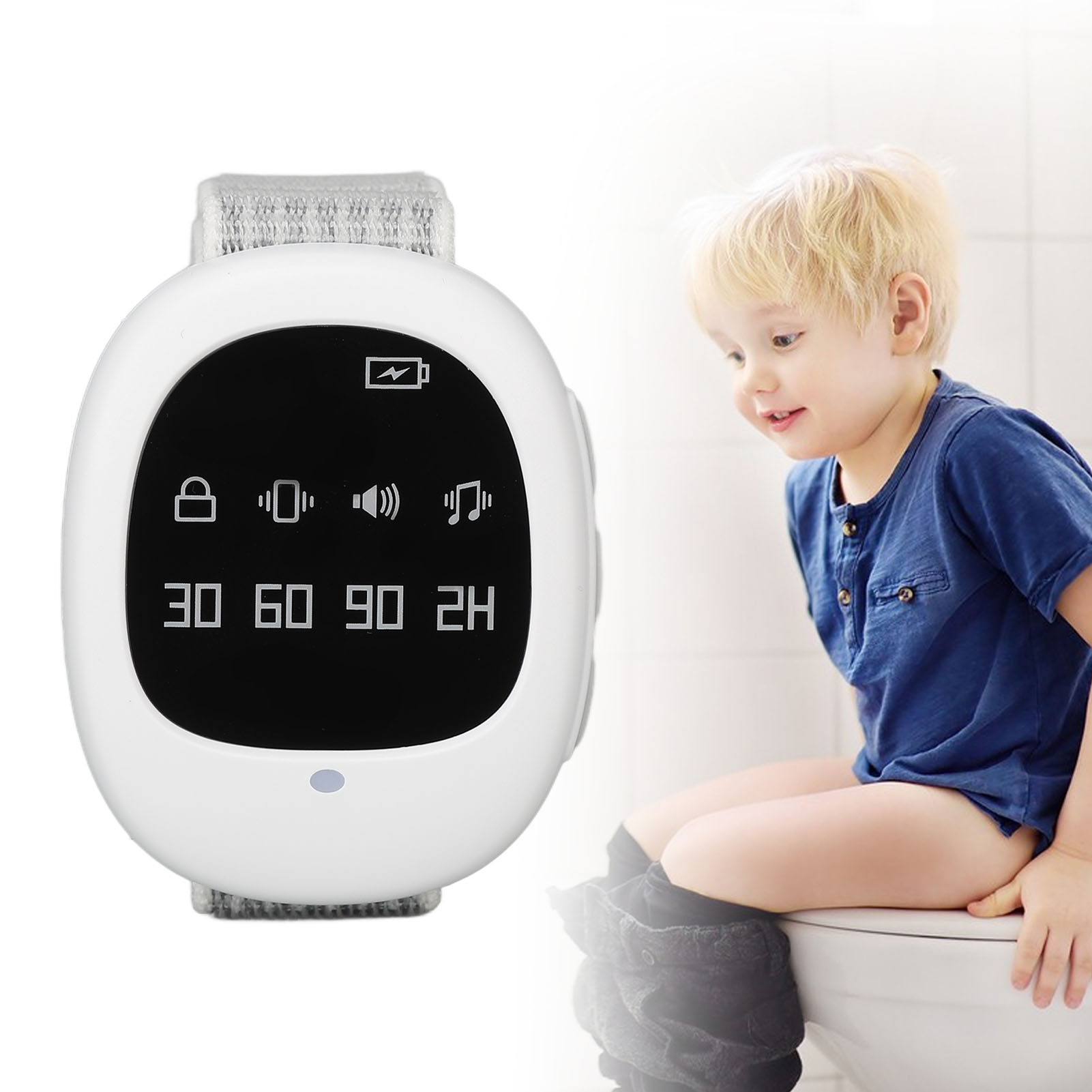 Ein Junge sitzt auf einer Toilette mit einem digitalen Gerät am Handgelenk.