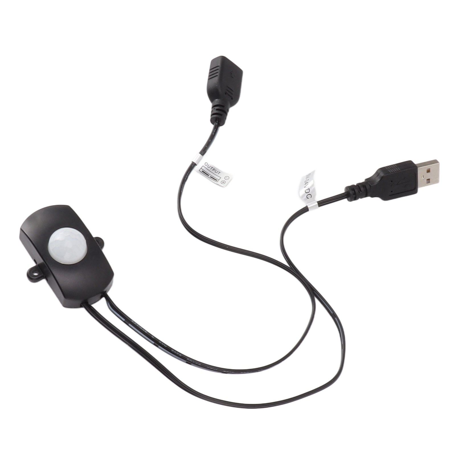 Schwarzer Bewegungssensor mit USB- und Ausgangsanschlüssen auf weißem Hintergrund.