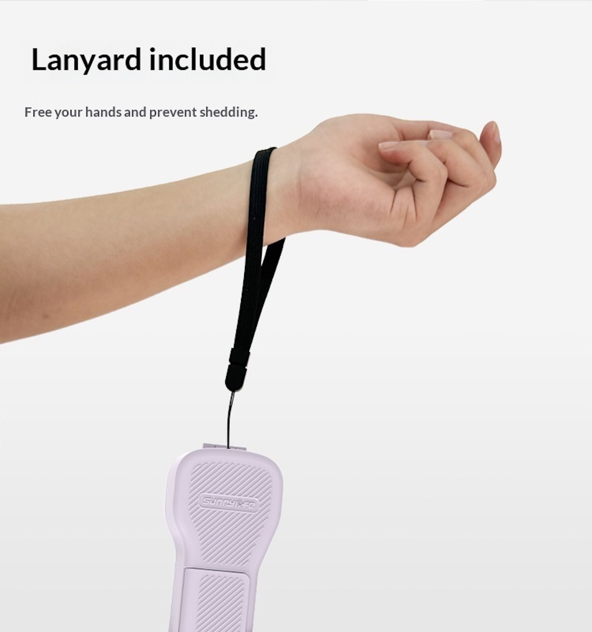 Ein Arm mit einem schwarzen Lanyard, das an einem hellvioletten Gerät befestigt ist.