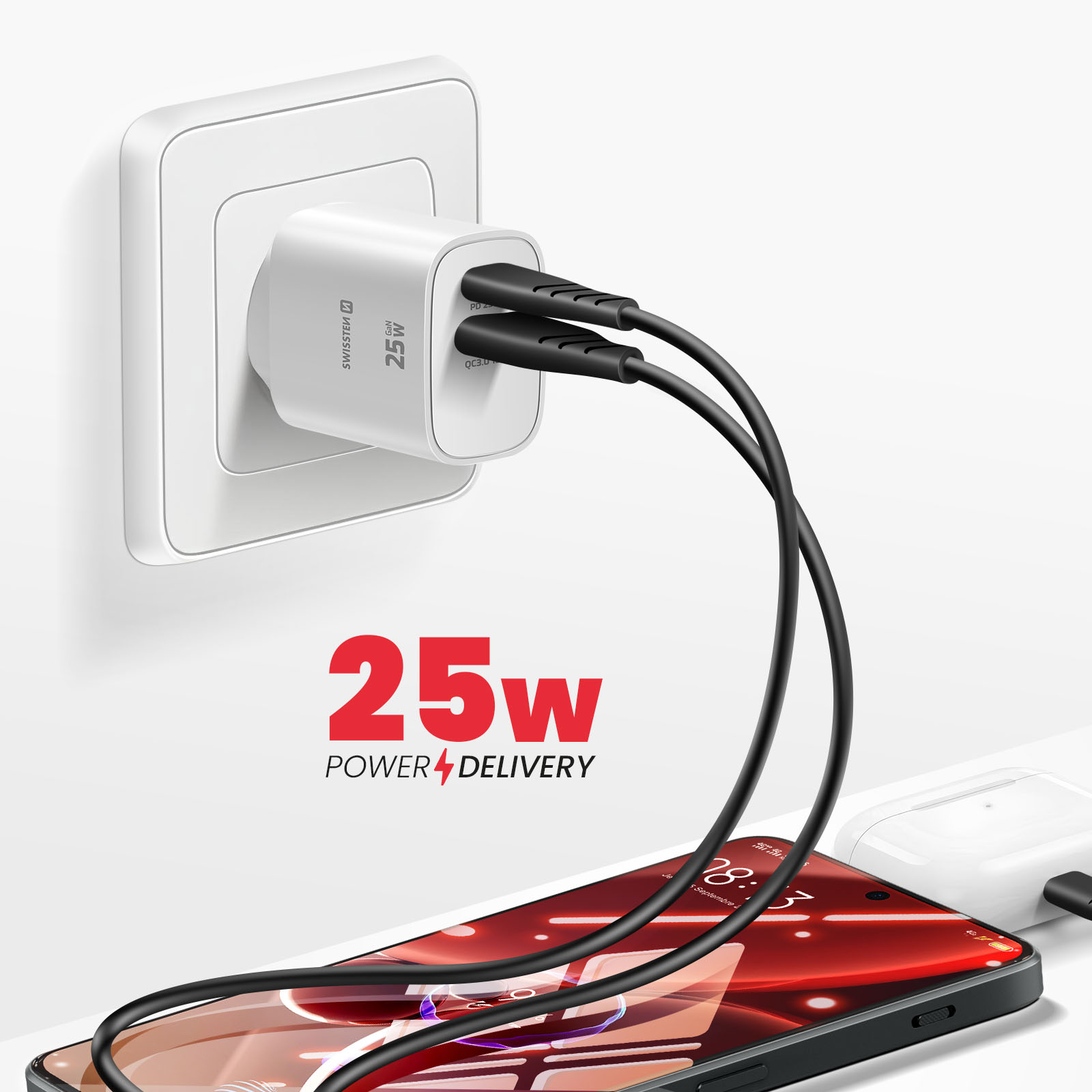 Ein weißer 25W-Netzadapter steckt in einer Steckdose, zwei schwarze Kabel verbinden sich mit einem Smartphone.