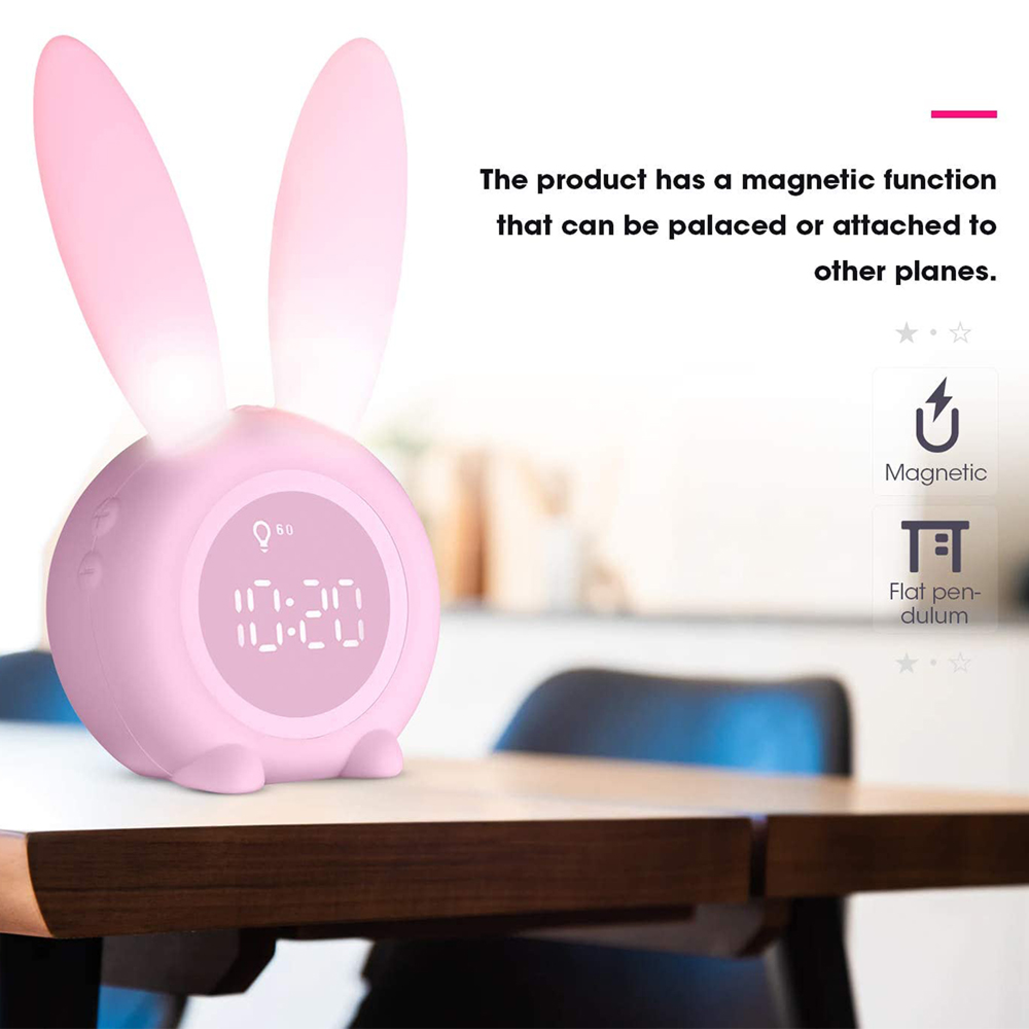 Ein rosa Wecker in Hasenform mit leuchtenden Ohren und digitaler Zeitanzeige.