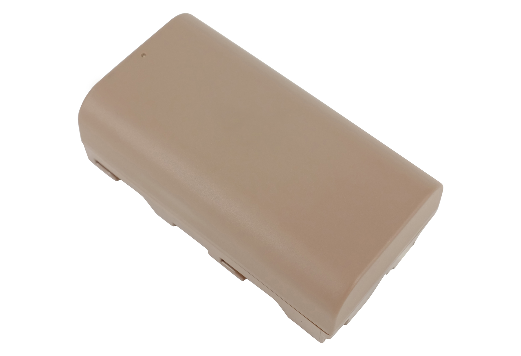 Eine beige Batterie mit abgerundeten Kanten, isoliert auf weißem Hintergrund.