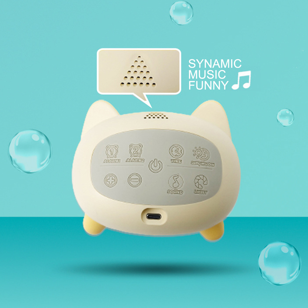 Eine beige Katze-förmige Uhr mit Knöpfen und einem USB-Anschluss.