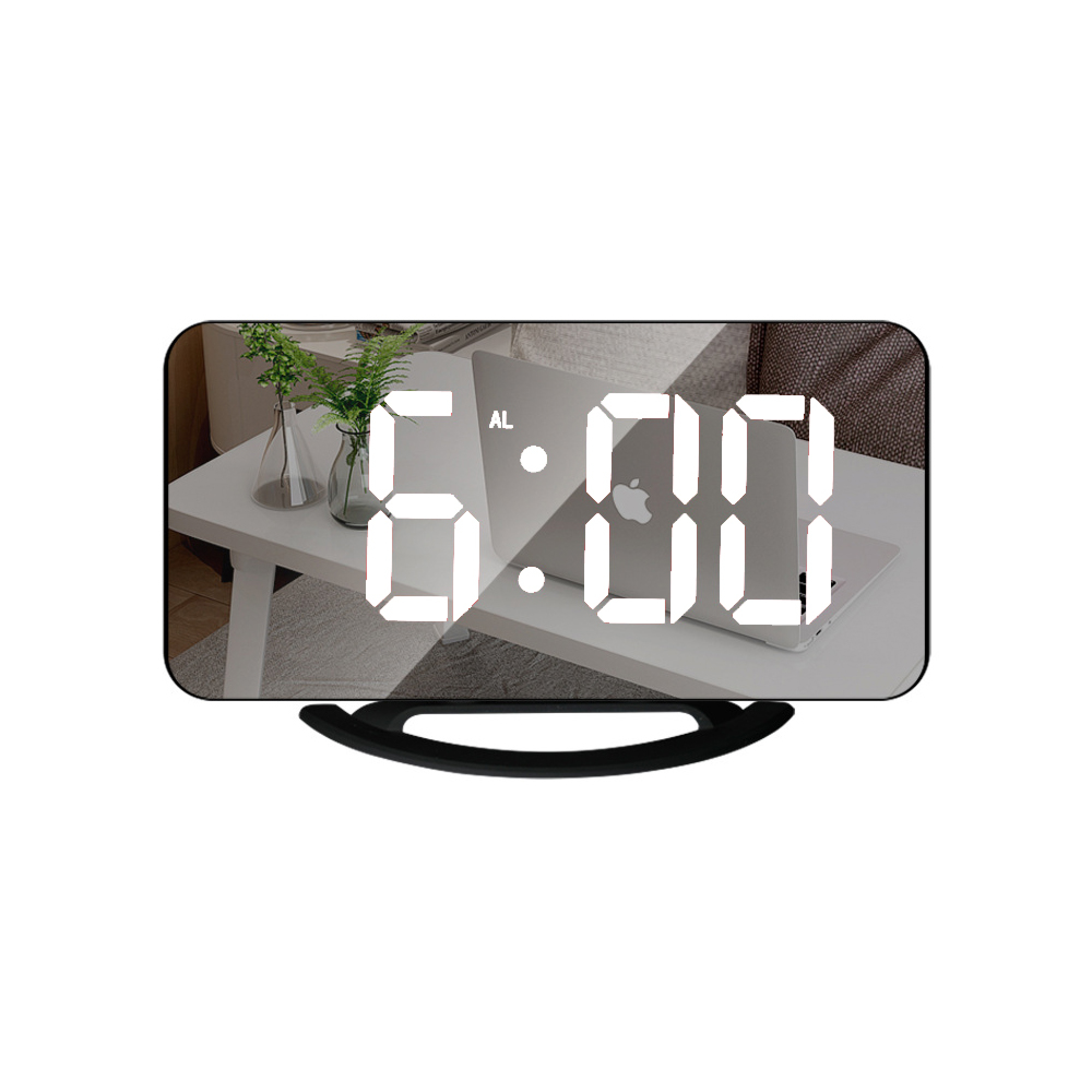 Digitaluhr zeigt 6:00 auf einem Laptop mit Pflanzen im Hintergrund.