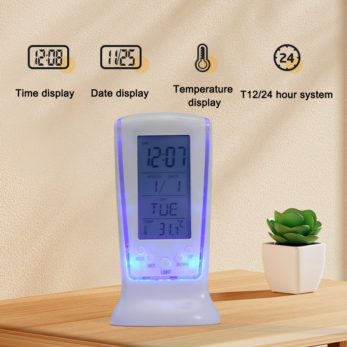 Ein weißer Digitalwecker mit blauer Hintergrundbeleuchtung zeigt Zeit, Datum und Temperatur an.