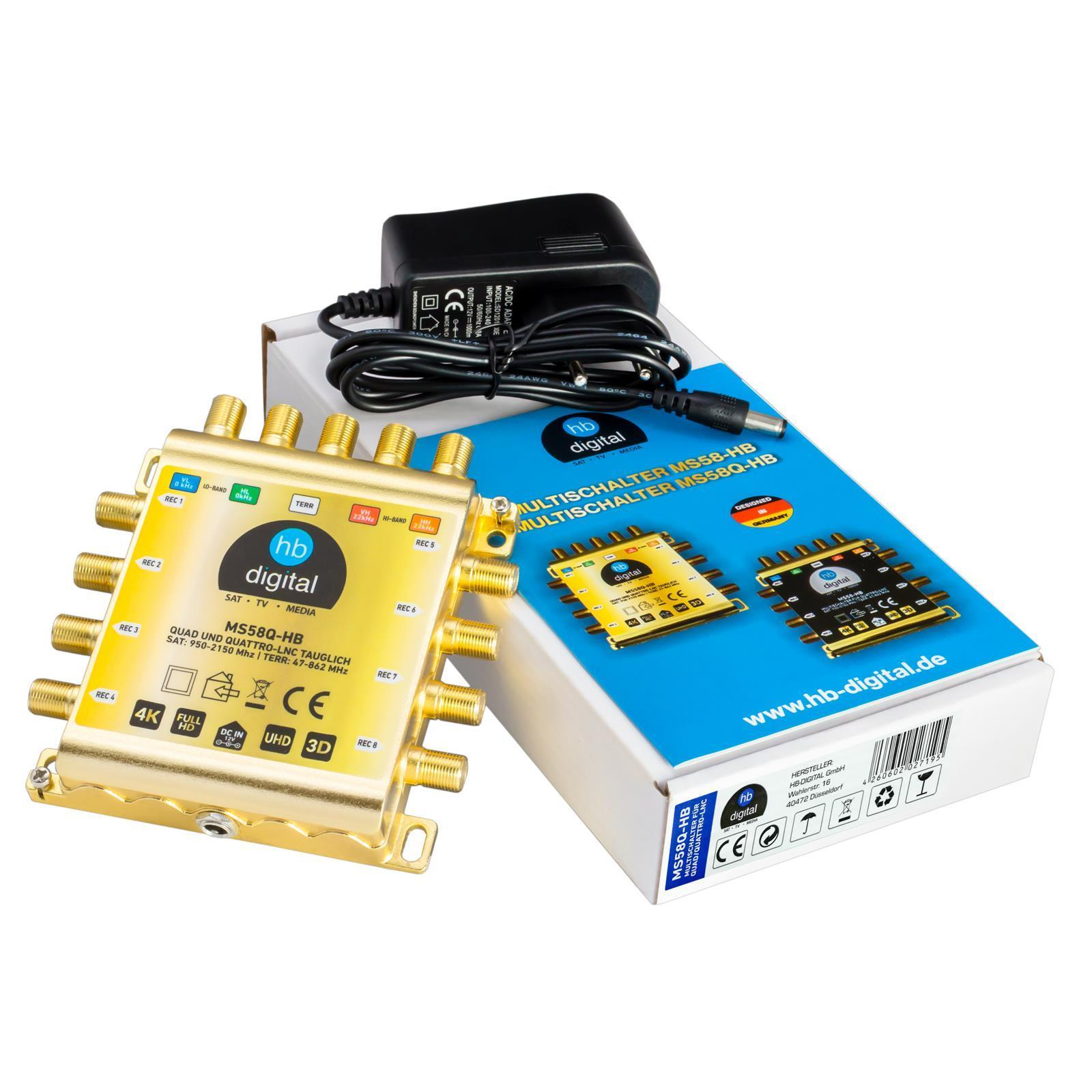 Goldener Multischalter mit Netzteil und Verpackung.