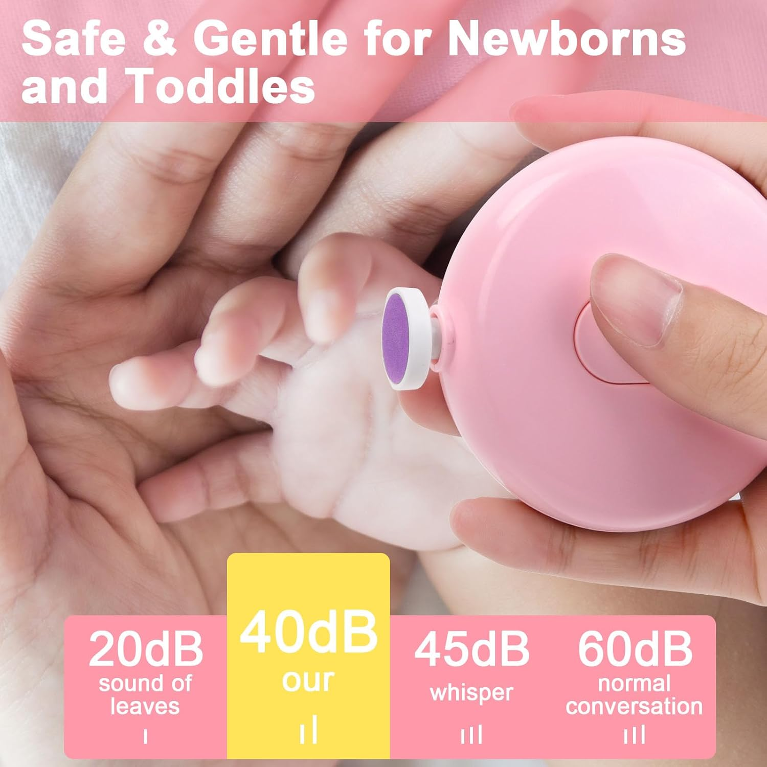 Ein rosa Nagelknipser für Babys liegt neben zarten Kinderhänden. Dezibelwerte sind angegeben.
