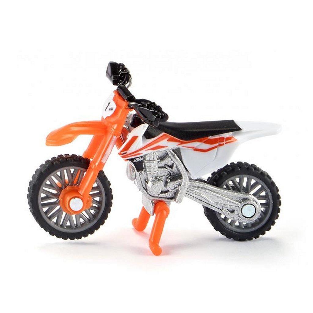 Eine orangefarbene Spielzeug-Motocross-Maschine mit weißen und schwarzen Akzenten.