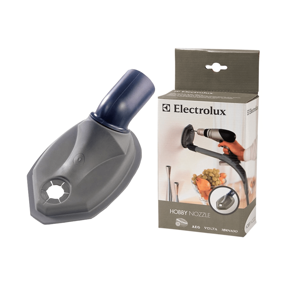 Grauer Elektrolux-Aufsatz und Verpackung mit Werkzeug und Obst.