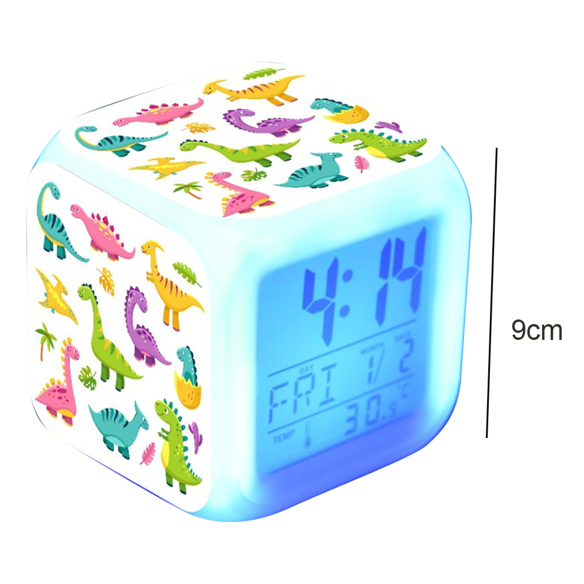 Ein würfelförmiger Wecker mit bunten Cartoon-Dinosauriern und blauem Digitaldisplay.