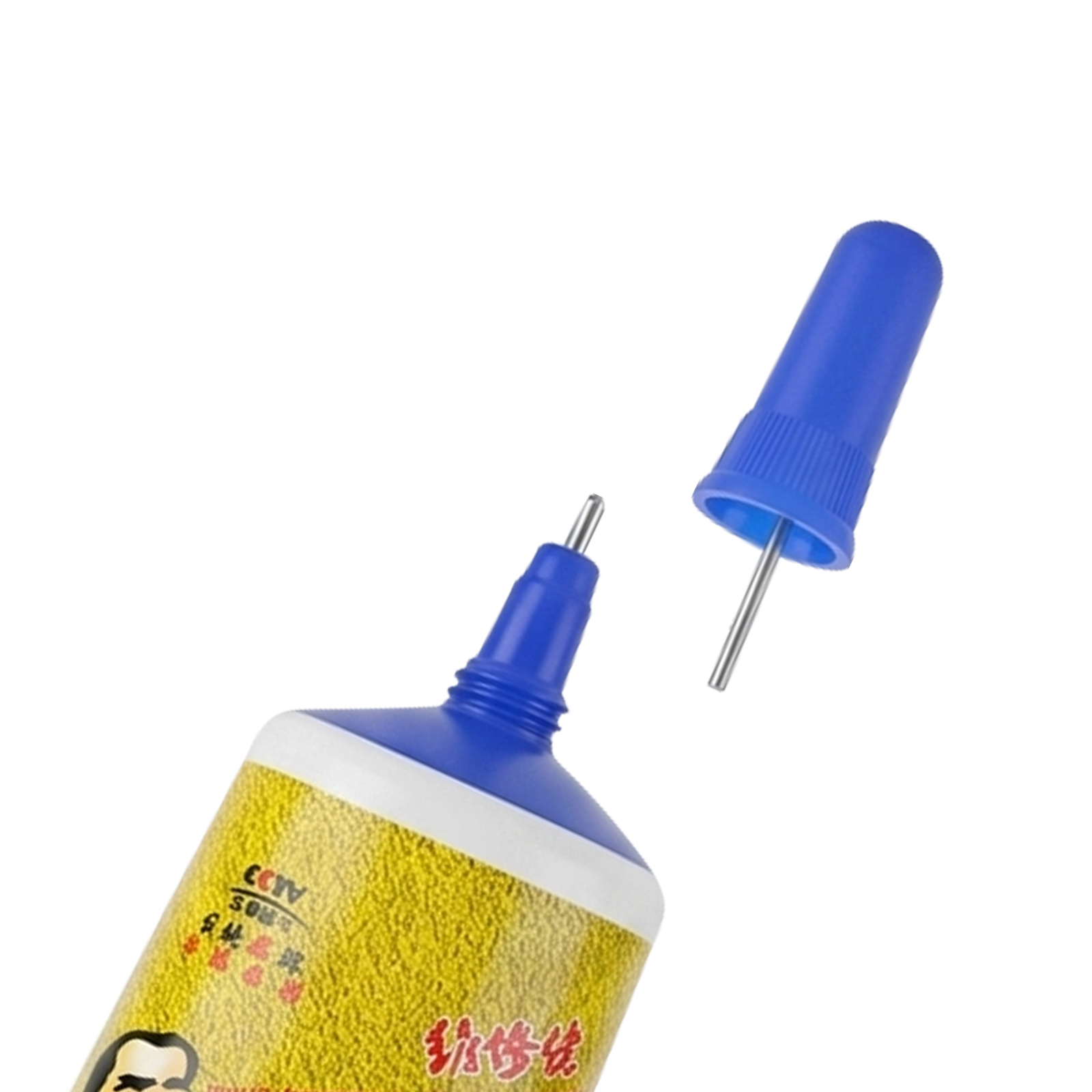 Eine gelbe Flasche mit blauer Spitze und abgenommenem Deckel, mit Metallnadel.