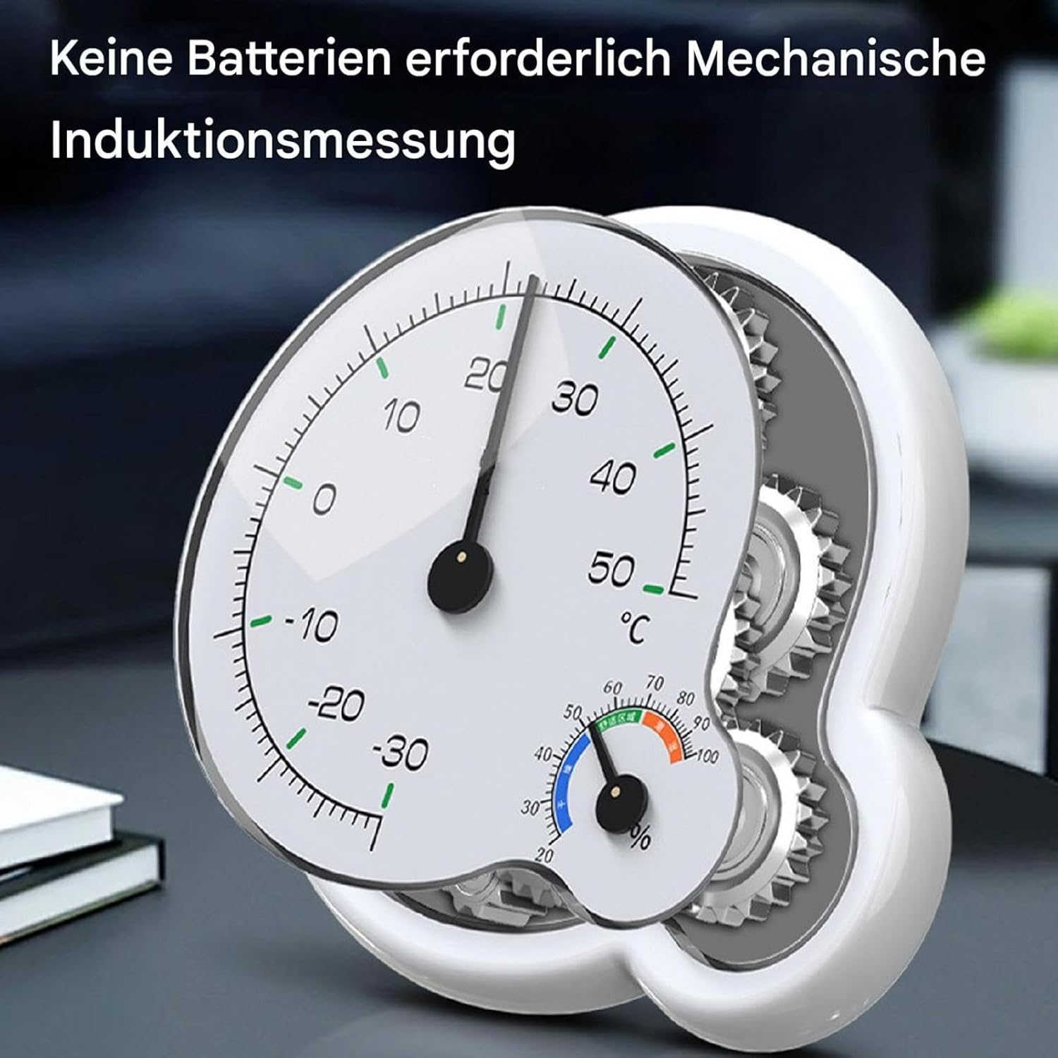 Mechanisches Thermometer und Hygrometer ohne Batterien mit sichtbaren Zahnrädern.