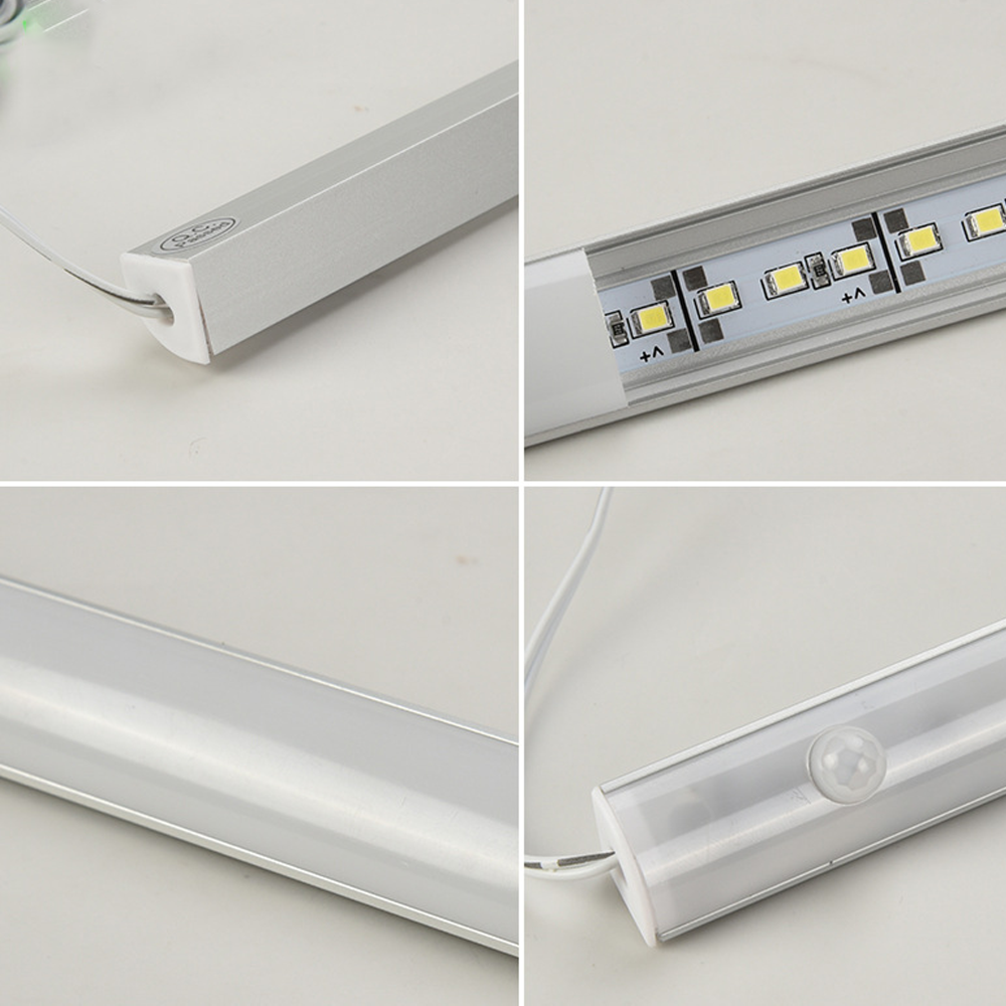 Ein silberner LED-Streifen mit weißen LEDs und einem Bewegungssensor.