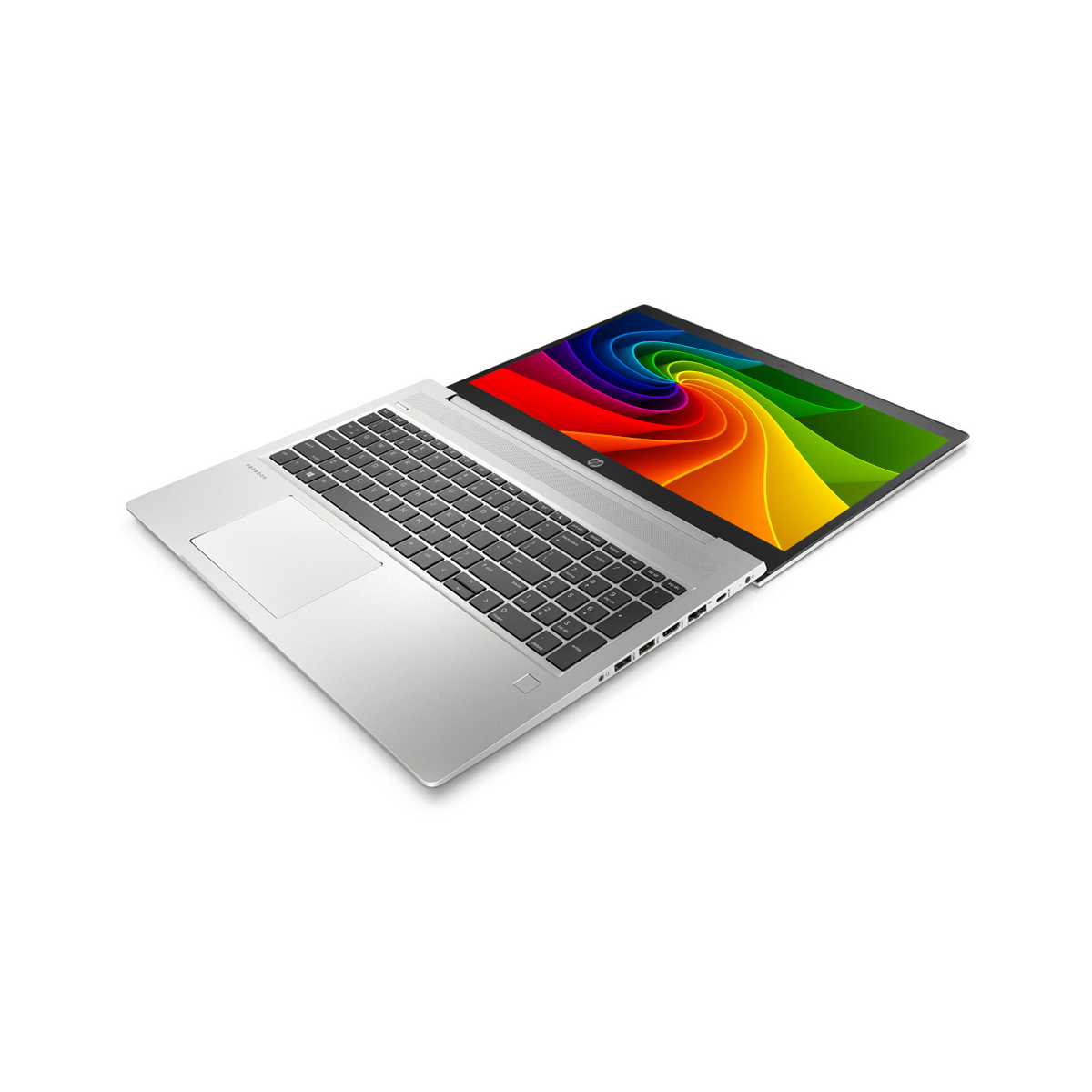 Ein offenes silbernes Laptop mit einem bunten Hintergrundbild auf dem Bildschirm.