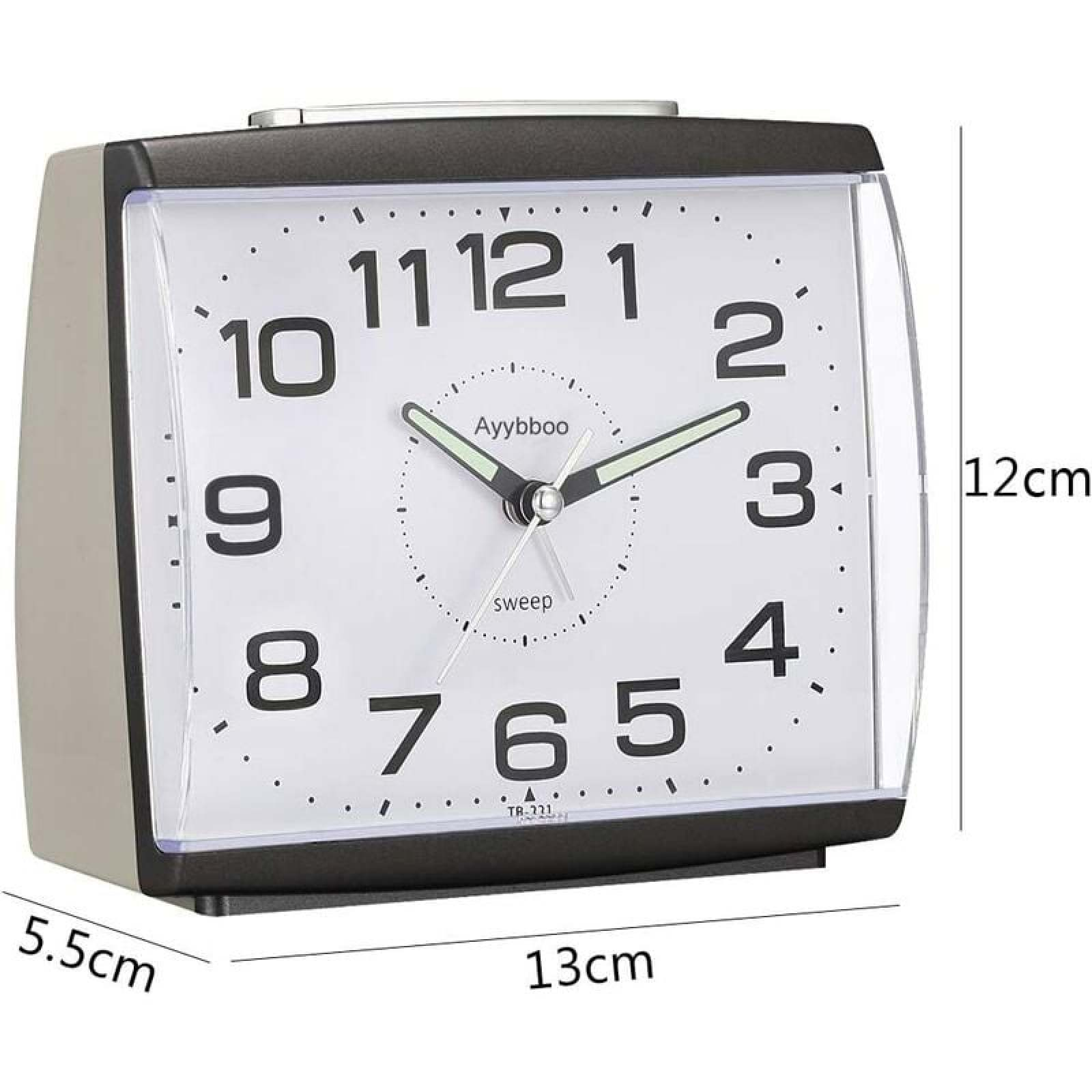 Eine schwarz-weiße analoge Weckuhr mit großen Ziffern. Zeit ist 10:09.