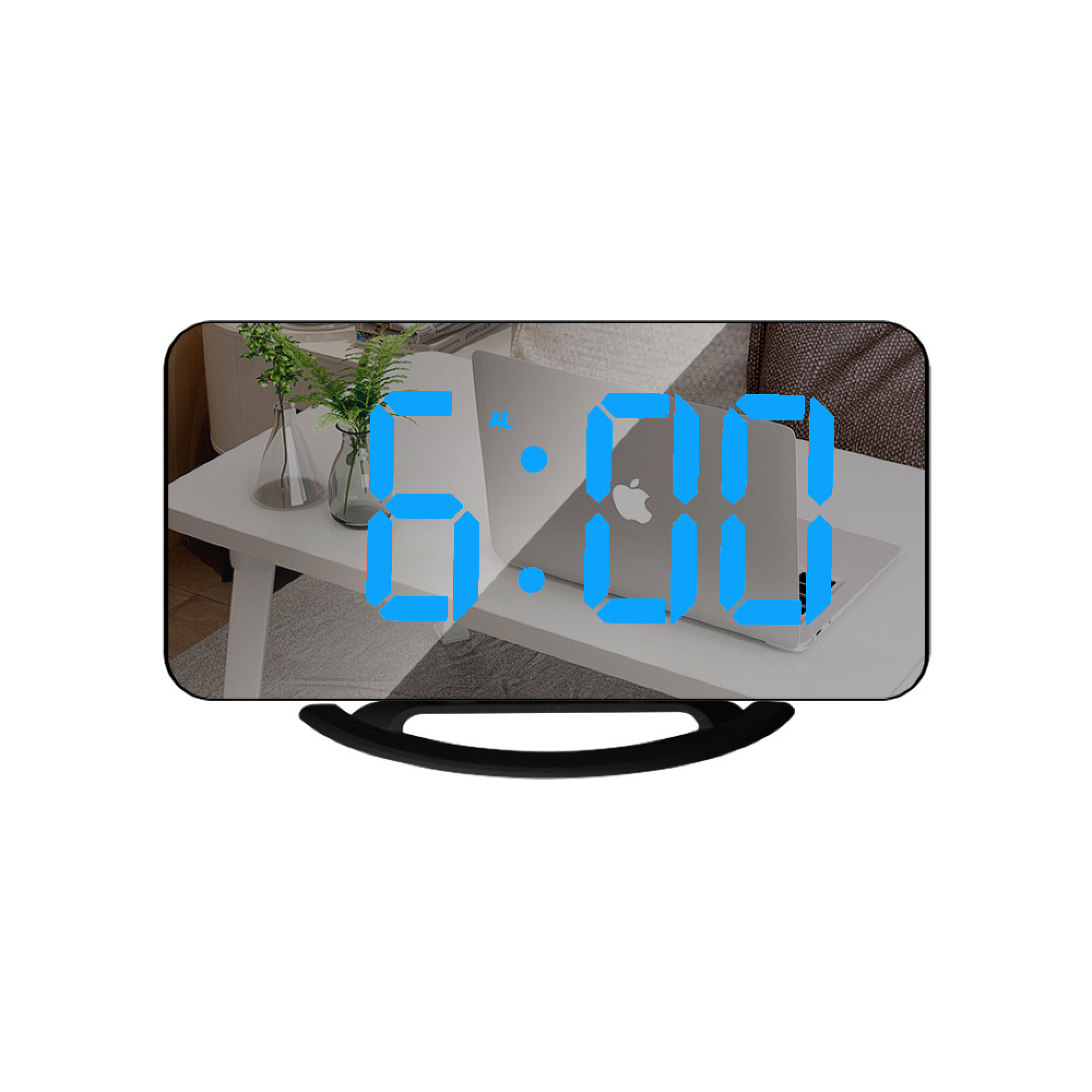 Digitaluhr zeigt 6:00 mit Laptop und Vase mit Pflanzen im Hintergrund.