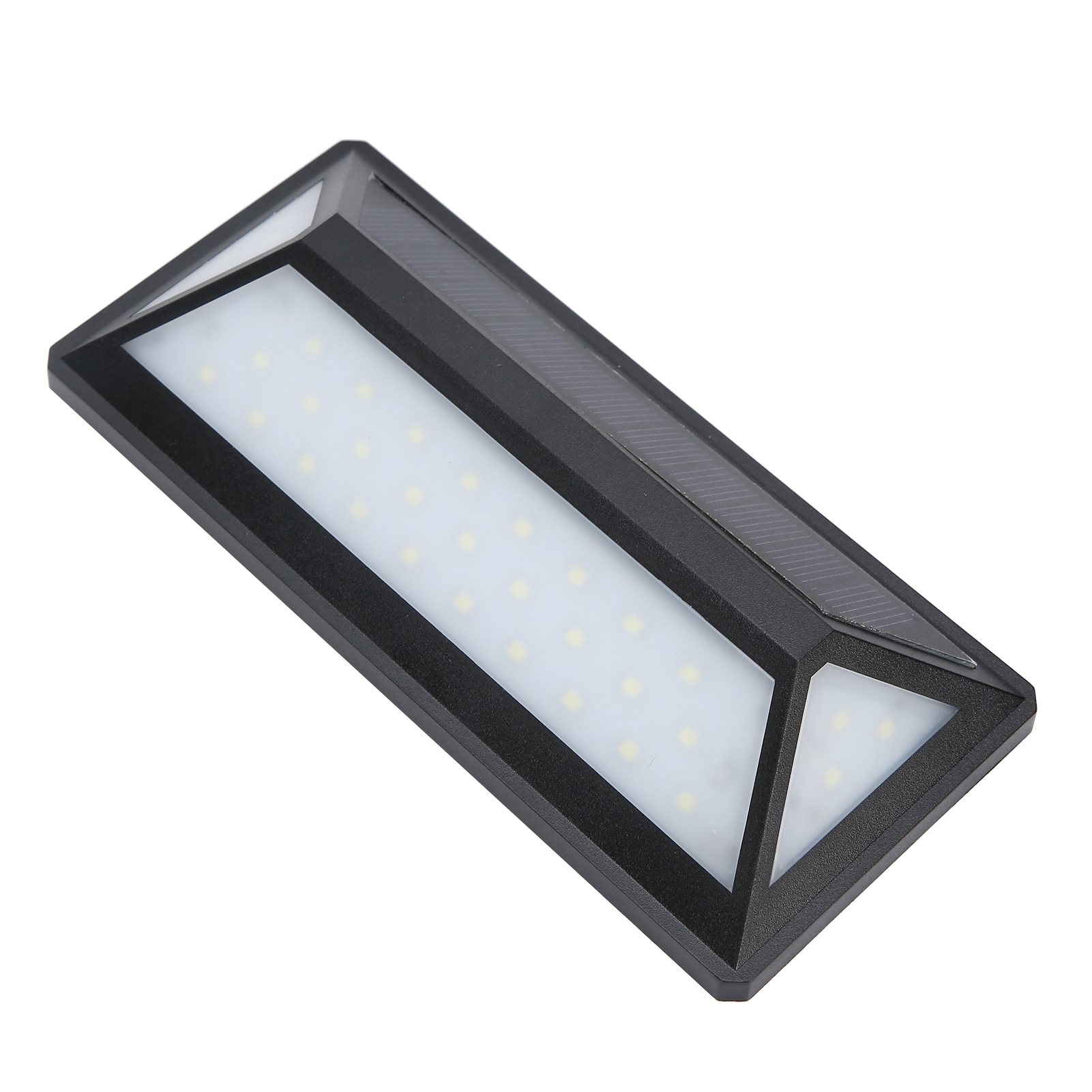Schwarze Solarleuchte mit vielen LEDs und Solarpanel auf der Oberseite.