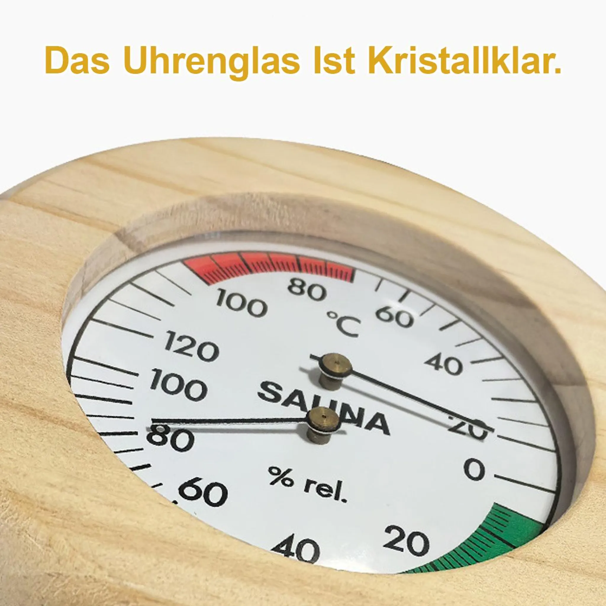 Ein Holzbalken umgibt ein Thermometer mit der Aufschrift SAUNA und % rel.