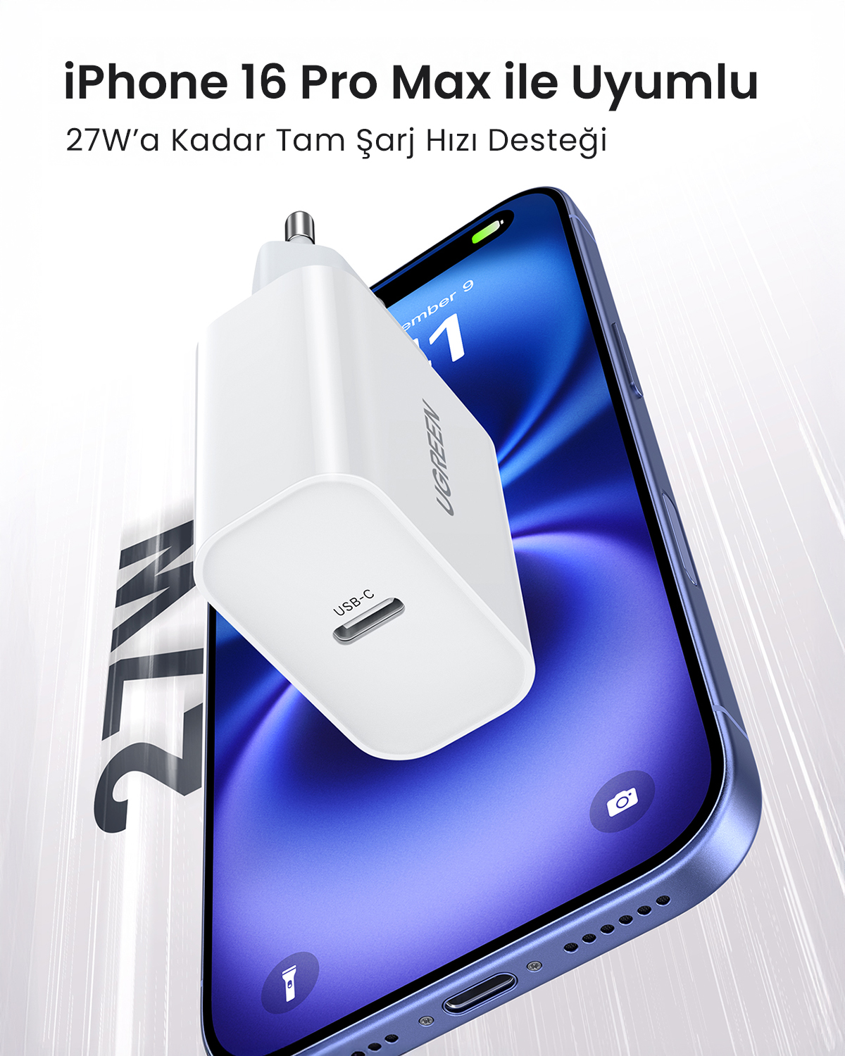 Ein weißes USB-C-Ladegerät über einem blauen iPhone, das 27W unterstützt.