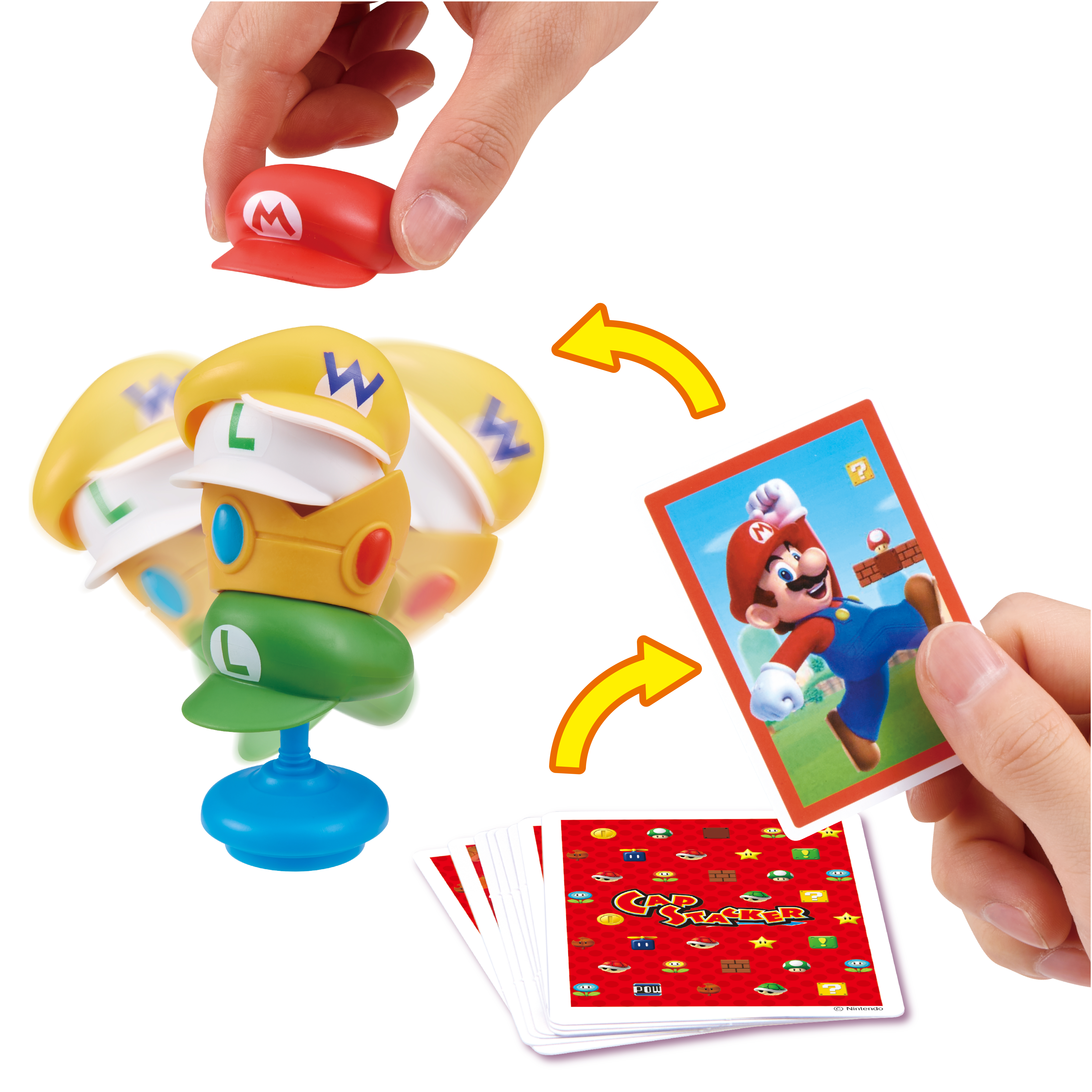 Piezas y cartas del juego Mario. Una mano coloca una gorra de Mario. Flechas amarillas apuntan a carta de Mario.