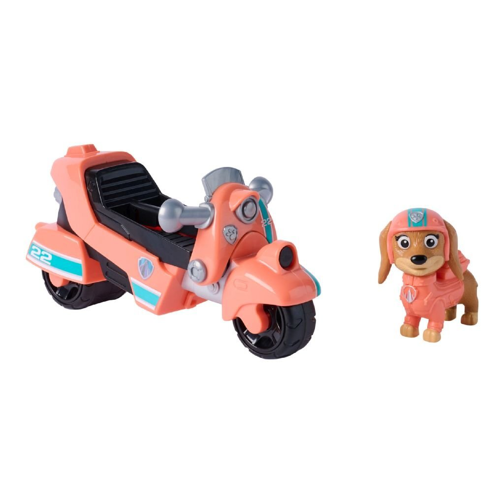 Una moto de juguete color coral con rayas azules y un perro con traje coral.