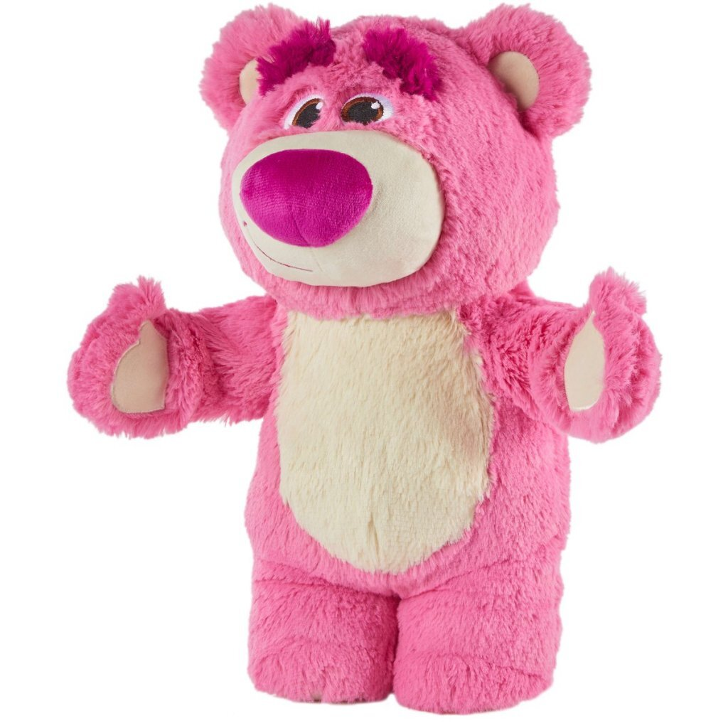 Un oso de peluche rosa con vientre beige y nariz rosa grande.