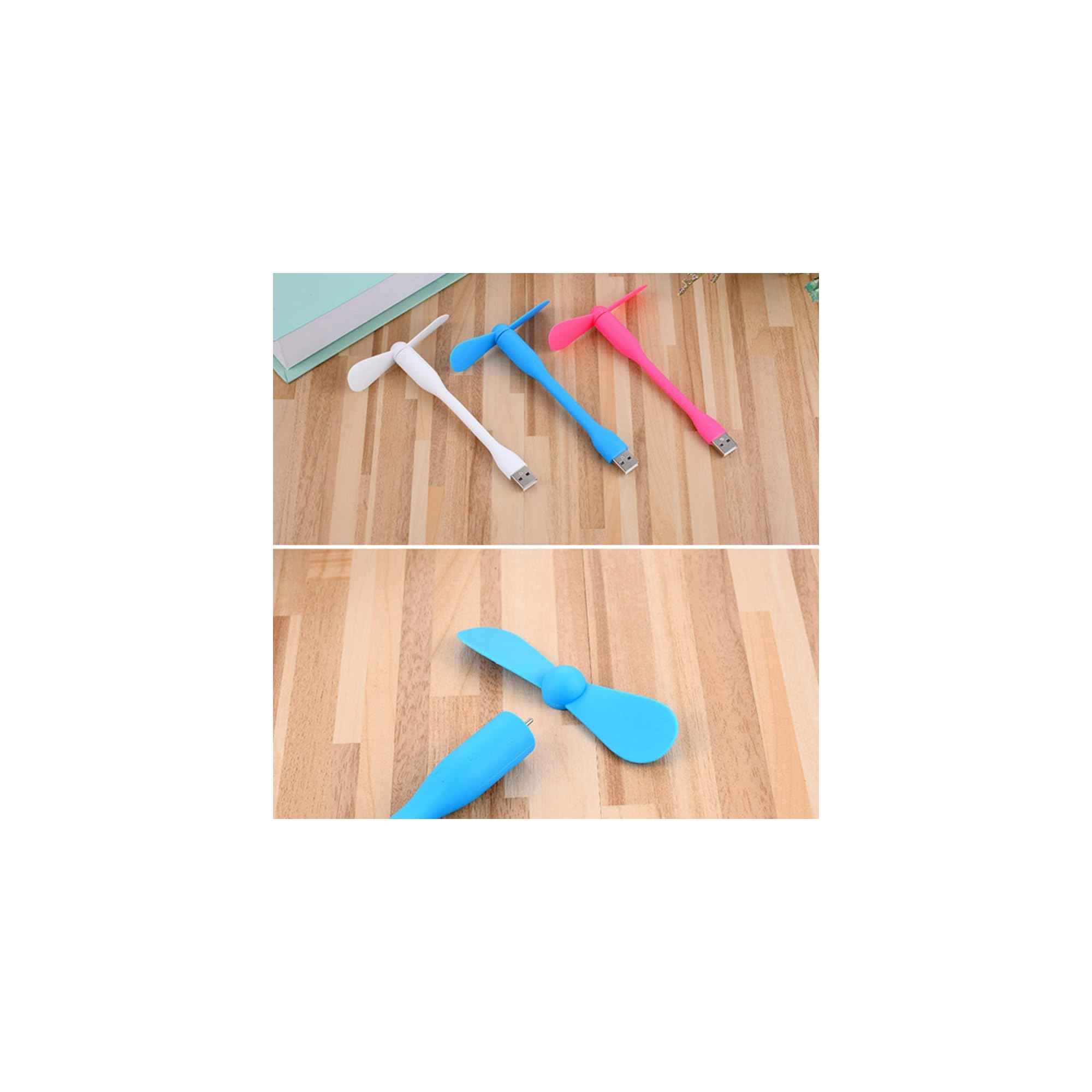 Drei USB-Ventilatoren in Weiß, Blau und Pink liegen auf einem Holztisch.