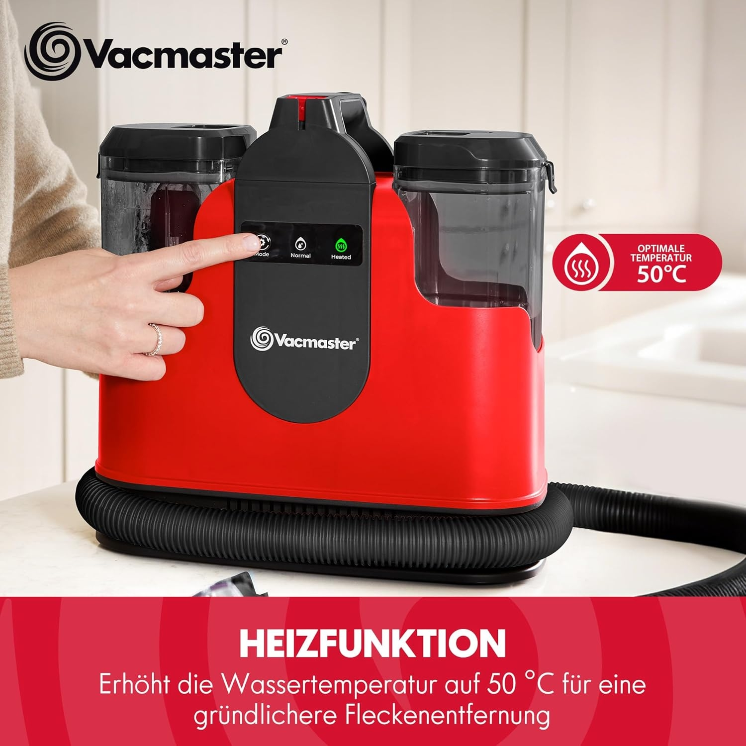 Ein roter und schwarzer Fleckenentferner von Vacmaster mit Bedienelementen und Anzeige für 50°C.