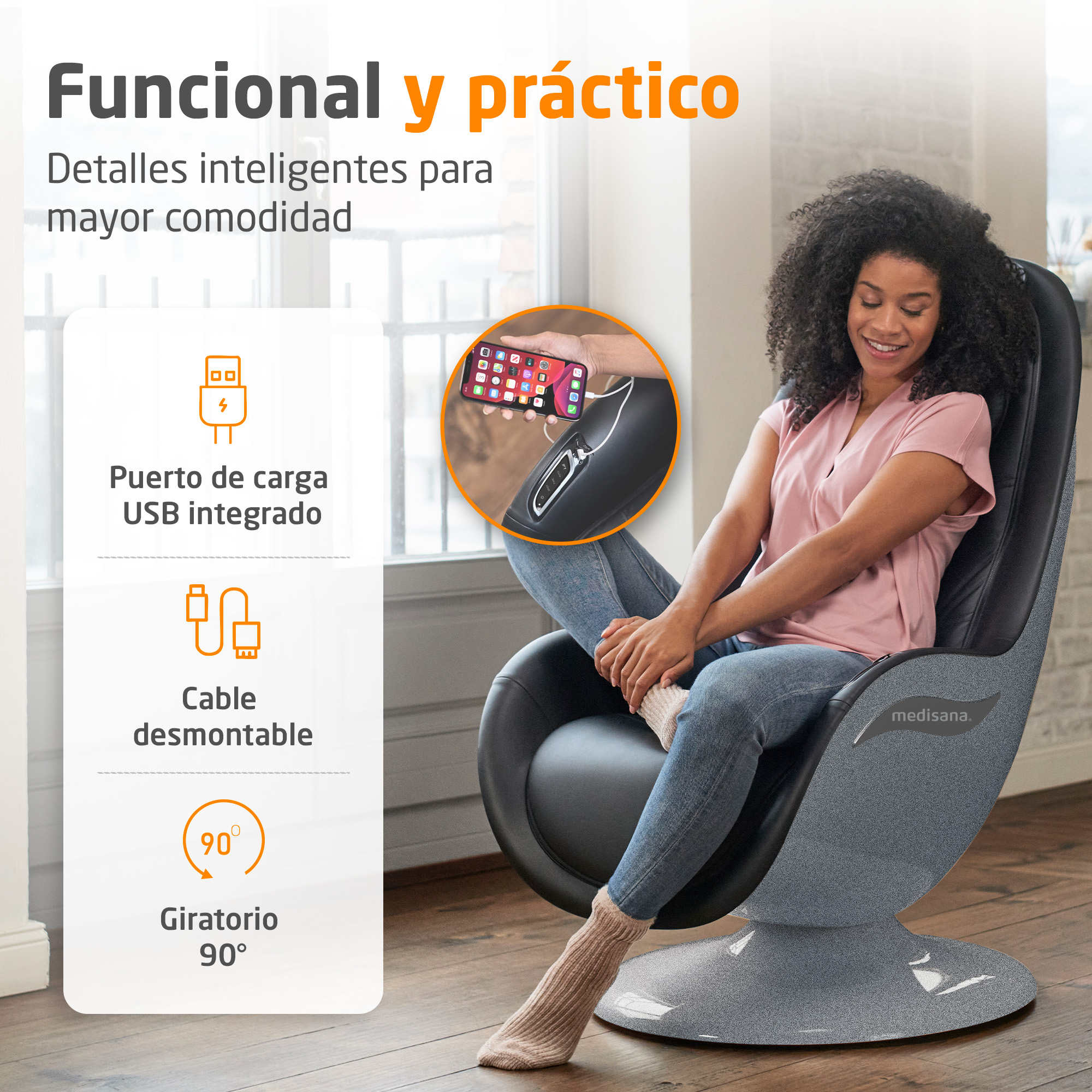 Una mujer sentada en un sillón de masaje medisana gris con puerto de carga USB.