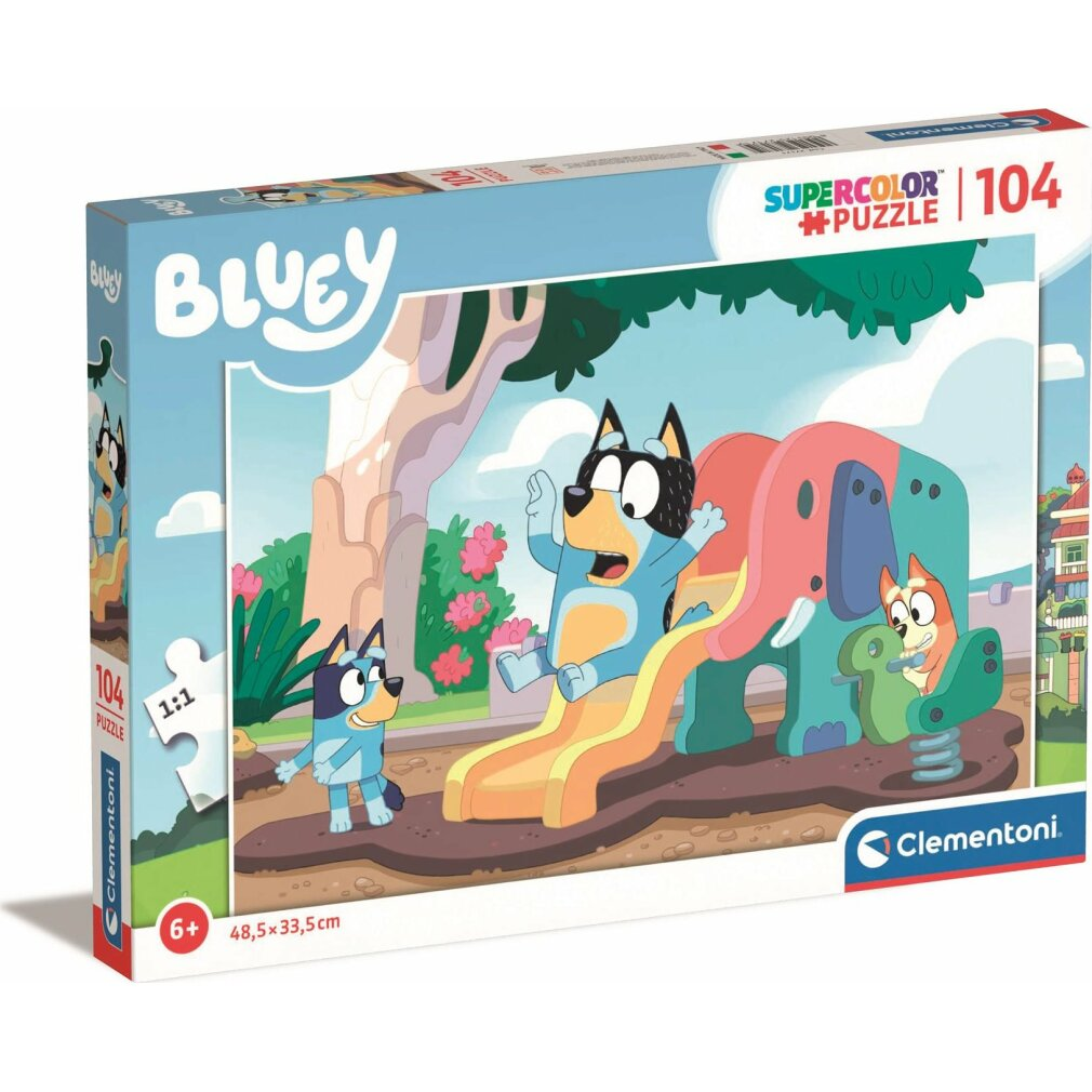 Puzzle Bluey z postaciami bawiącymi się na zjeżdżalni w kształcie słonia i zabawką.